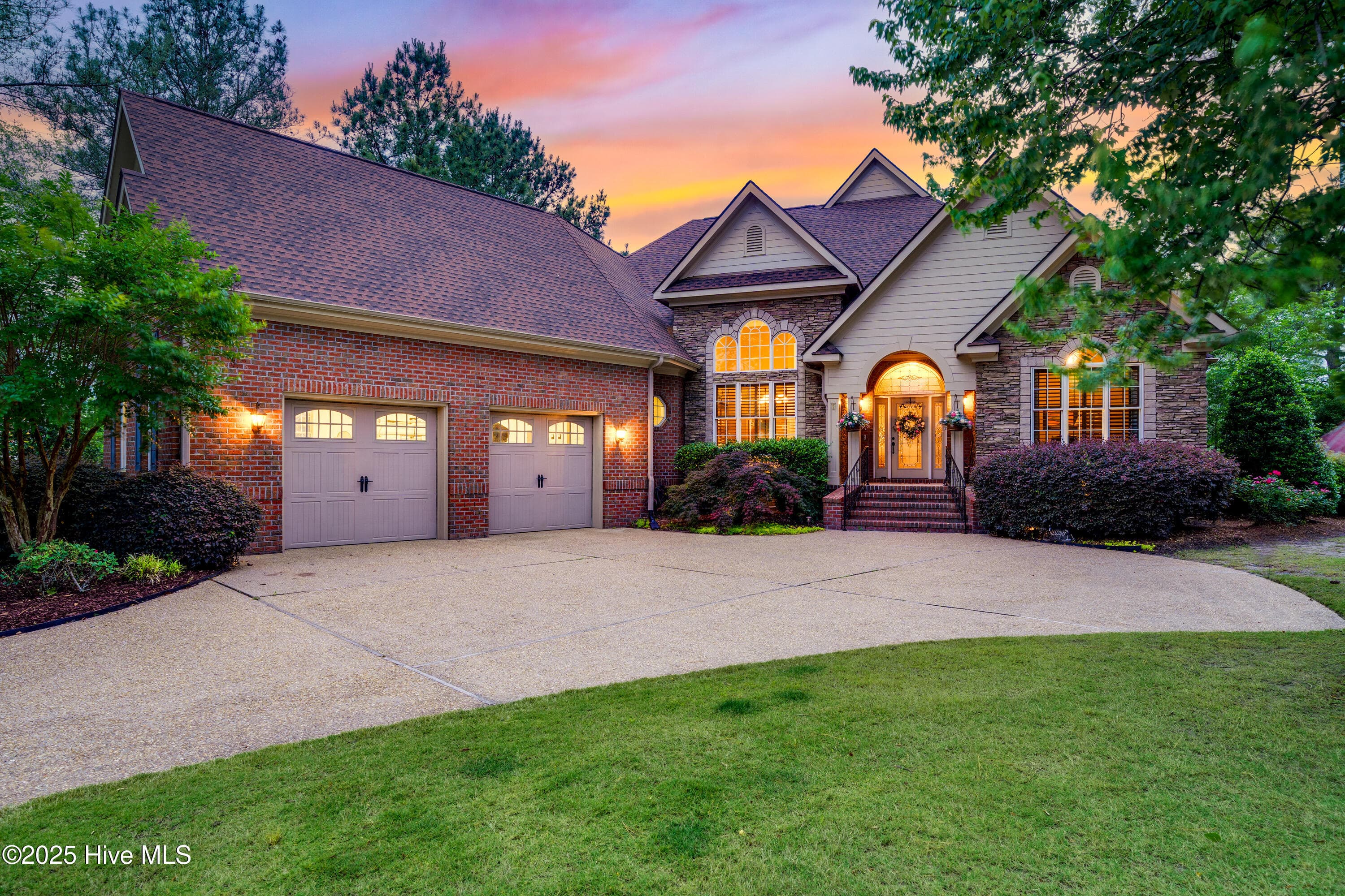 Front of 115 Legacy Lakes Drive, Wallace, NC 28466