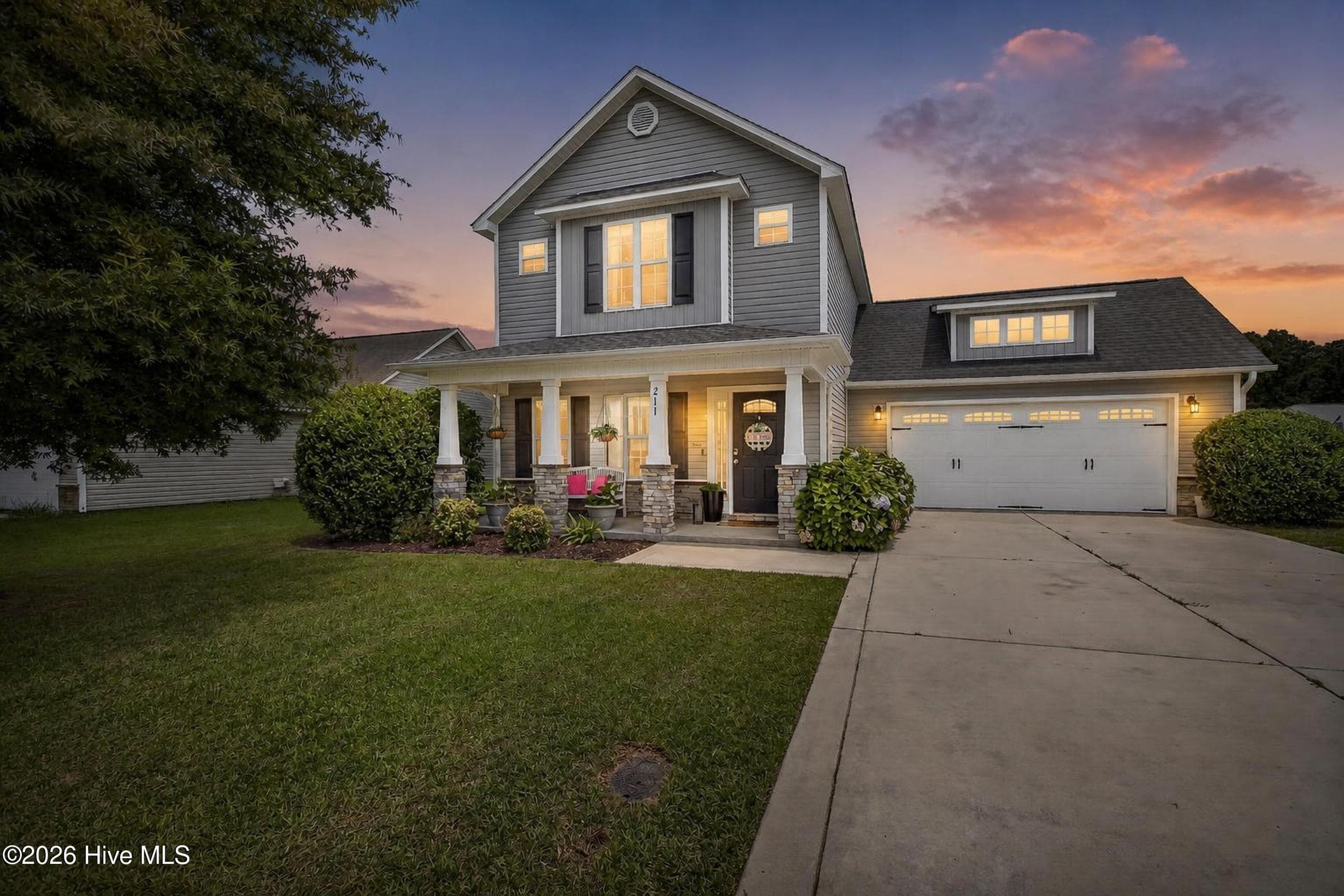 Front of 211 Adagio Trail, Richlands, NC 28574