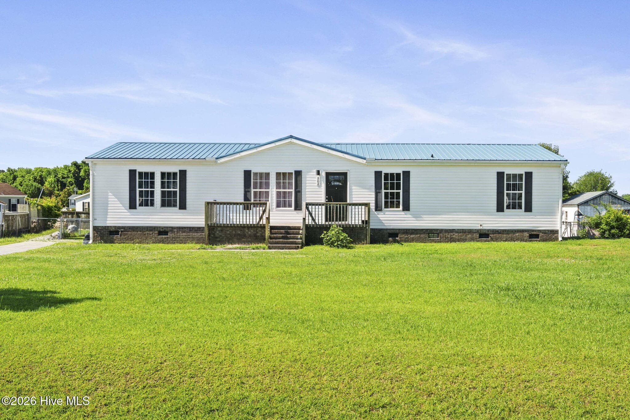 Front of 202 Red Sorrel Drive, Stella, NC 28582