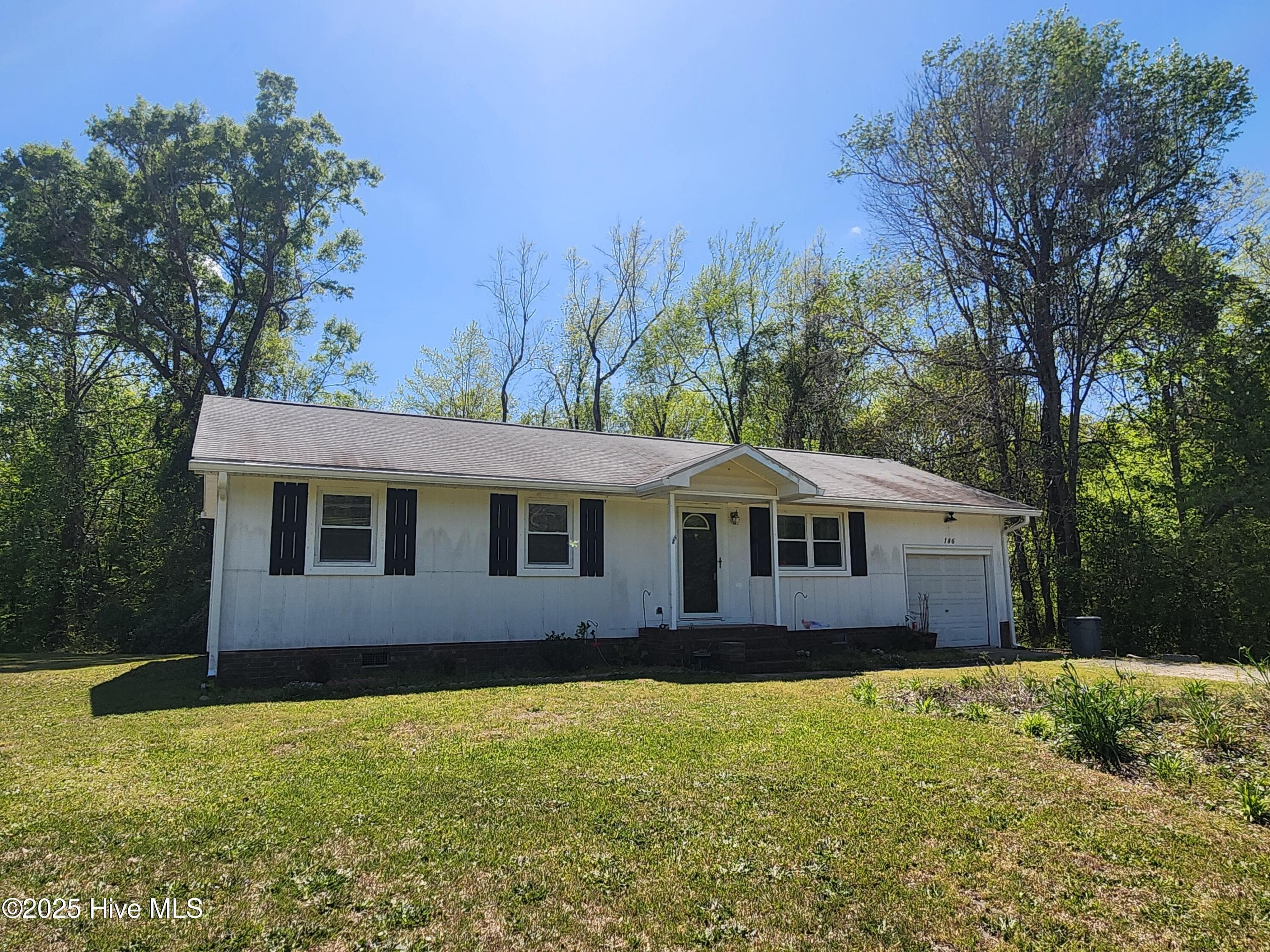 Front of 186 Sand Ridge Road, Hubert, NC 28539