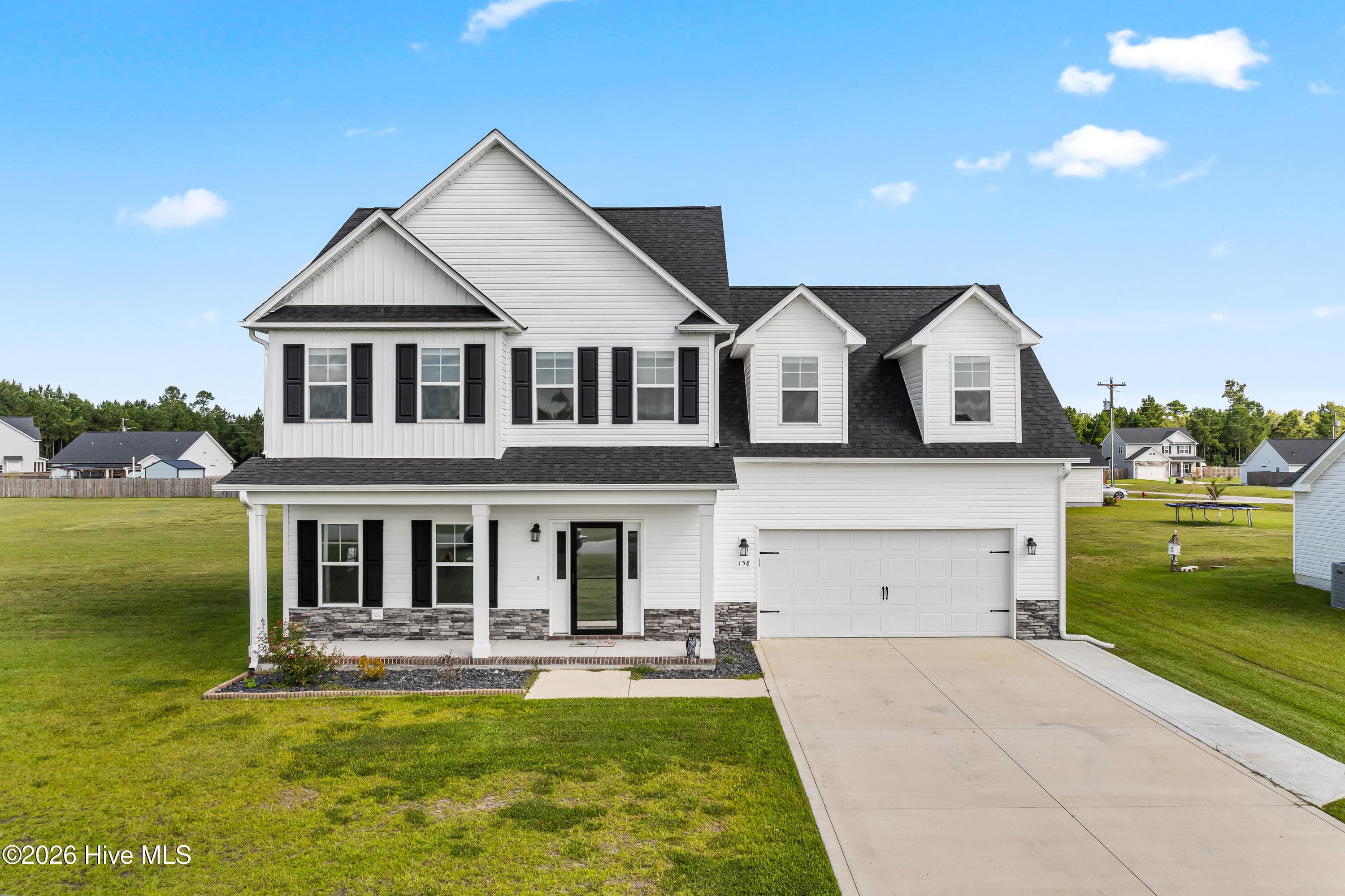 Front of 158 Uzzell Road, Hubert, NC 28539