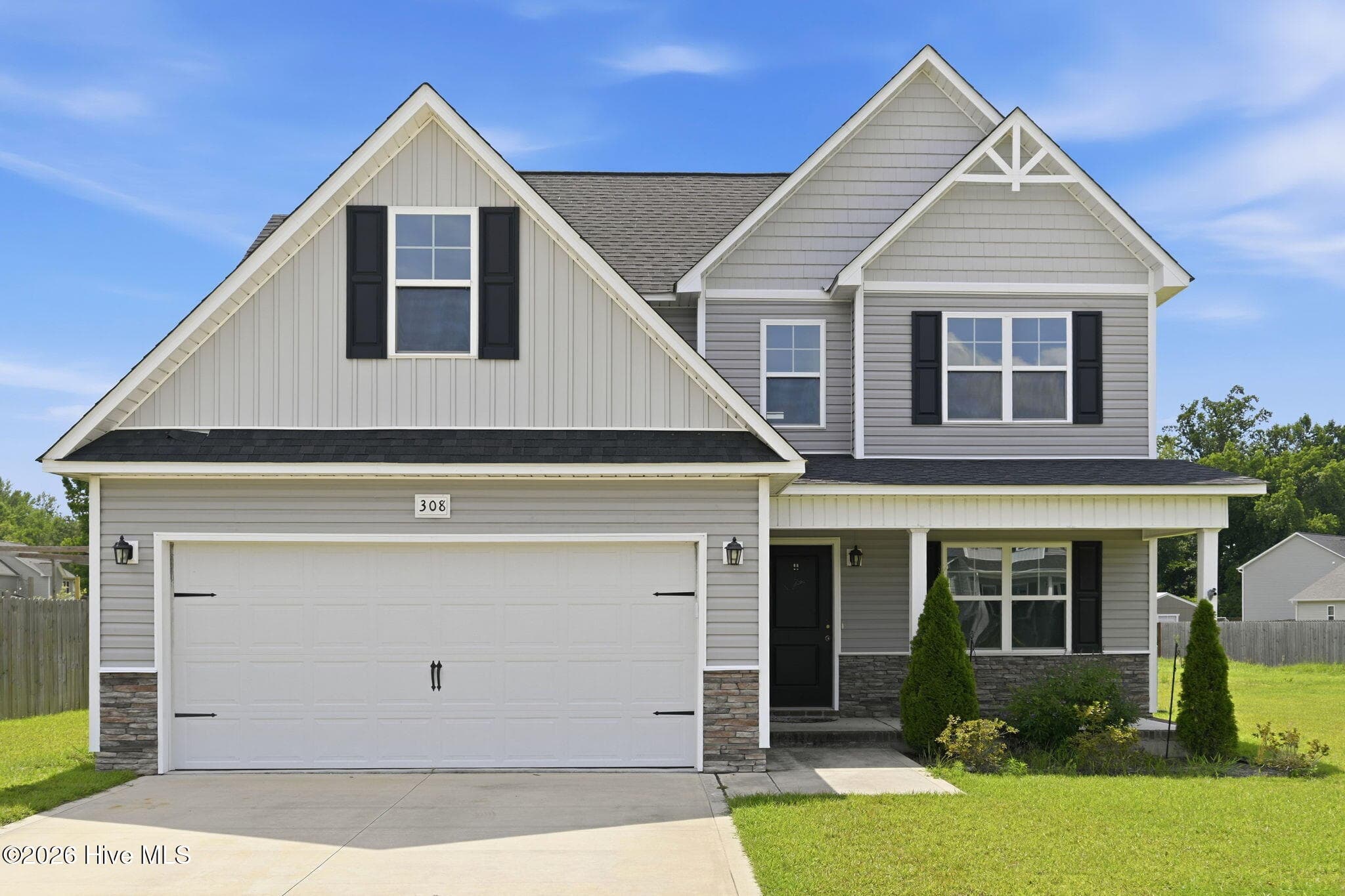 Front of 308 Sunrose Drive, Maysville, NC 28555