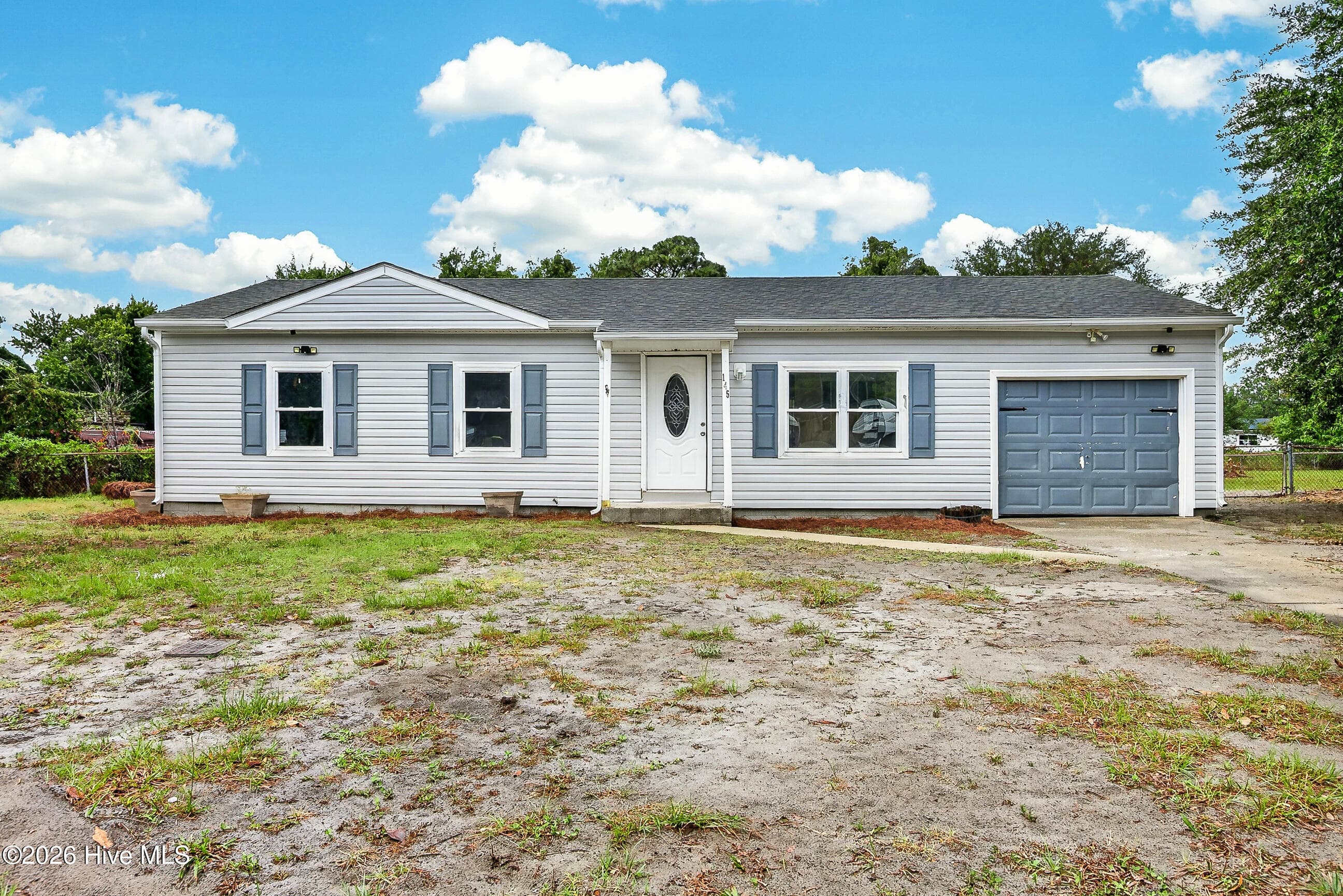 Front of 145 Ash Court, Hubert, NC 28539