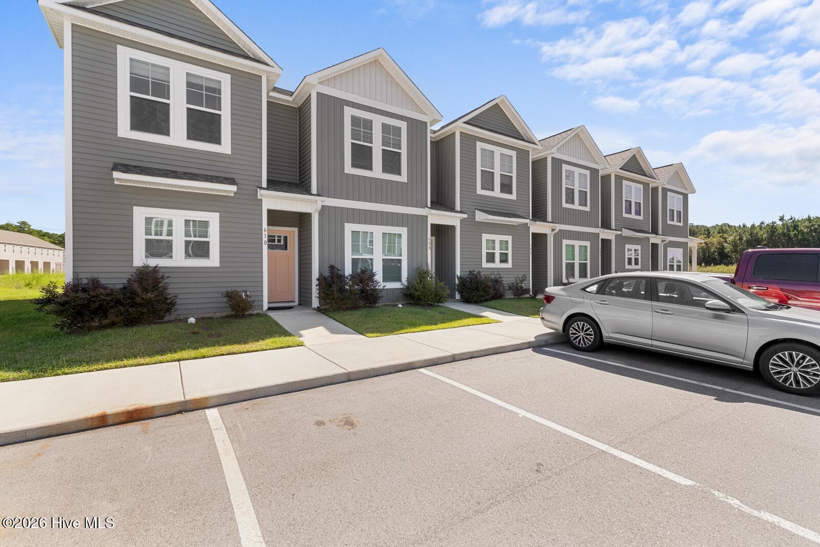 Front of 608 Jacks Crossing Drive, Hubert, NC 28539