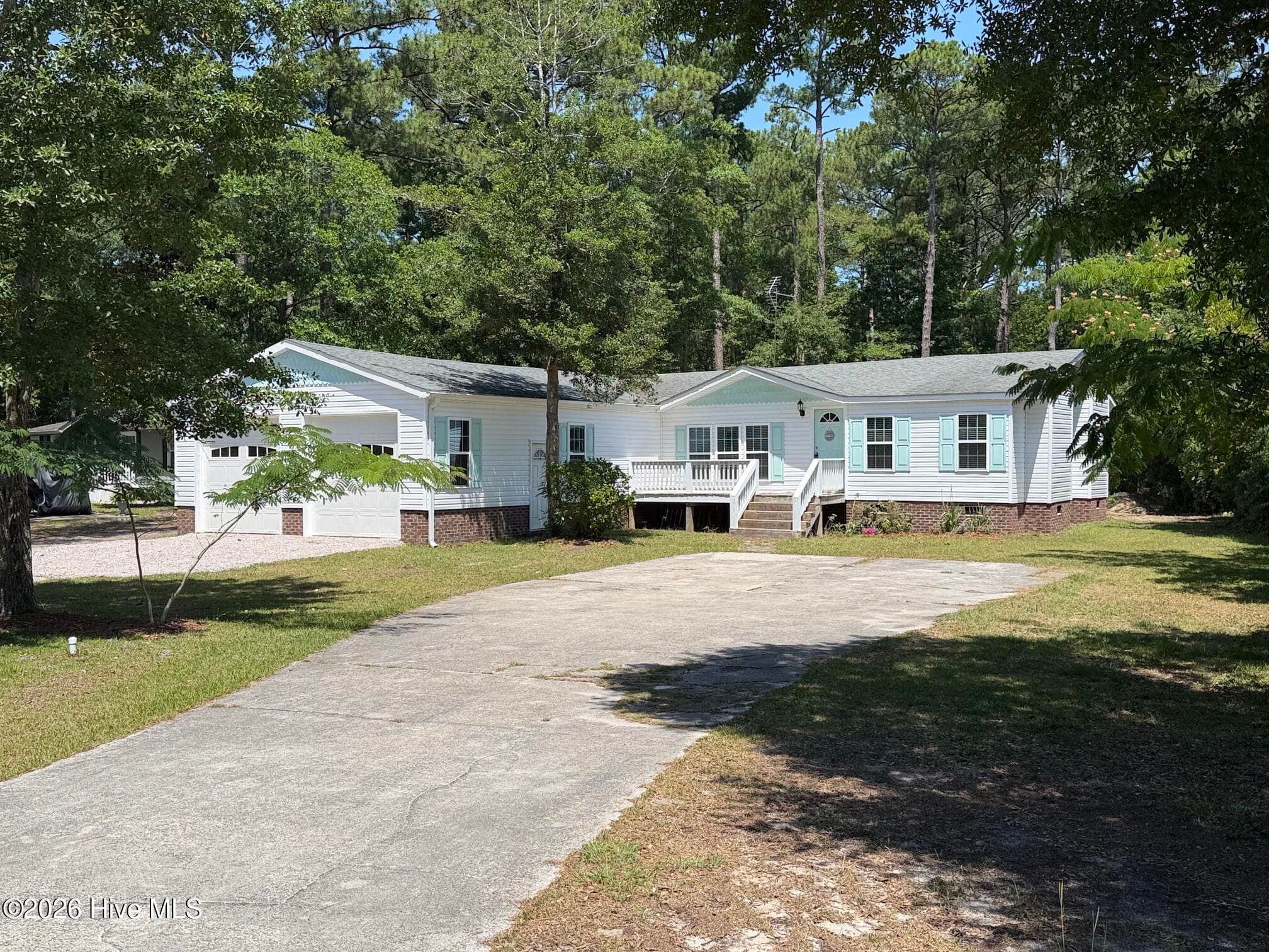 Front of 135 Bogue Forest Drive, Newport, NC 28570