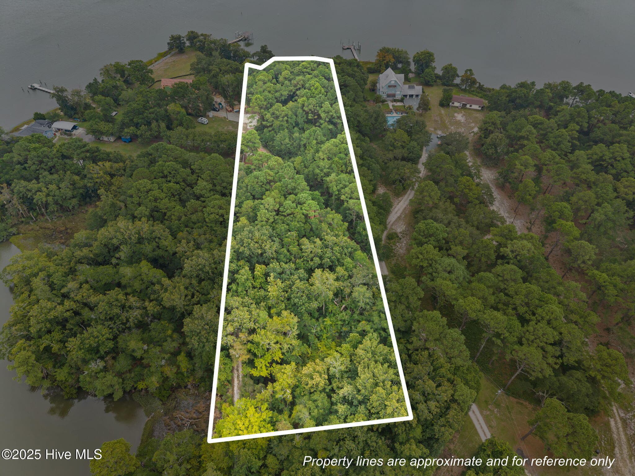 Front of 128 3 Missie Cove Lane, Sneads Ferry, NC 28460
