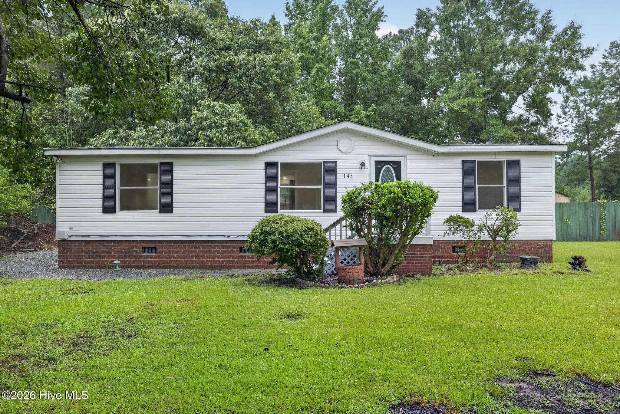 Front of 145 Bellhammon Forest Drive, Rocky Point, NC 28457