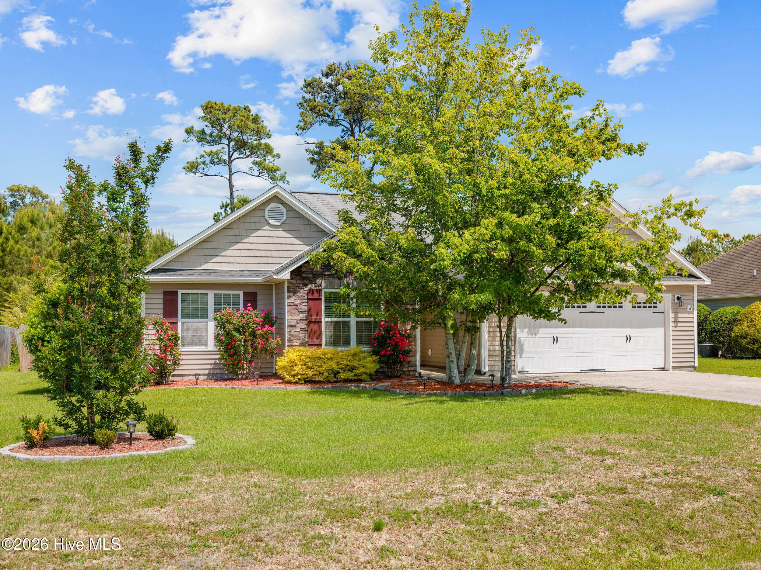 Front of 210 Marsh Haven Drive, Sneads Ferry, NC 28460