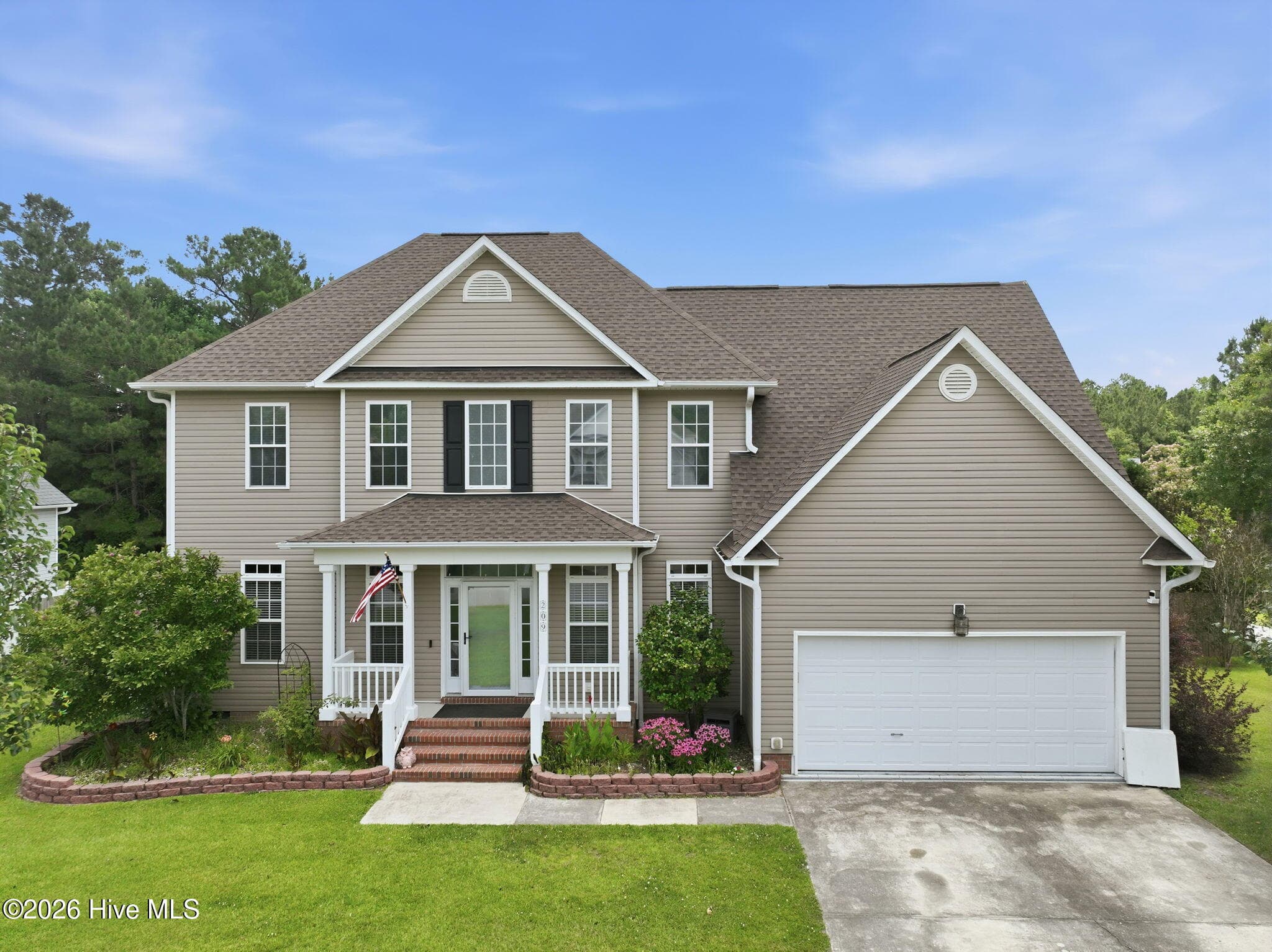 Front of 209 Middle Ridge Drive, Hubert, NC 28539
