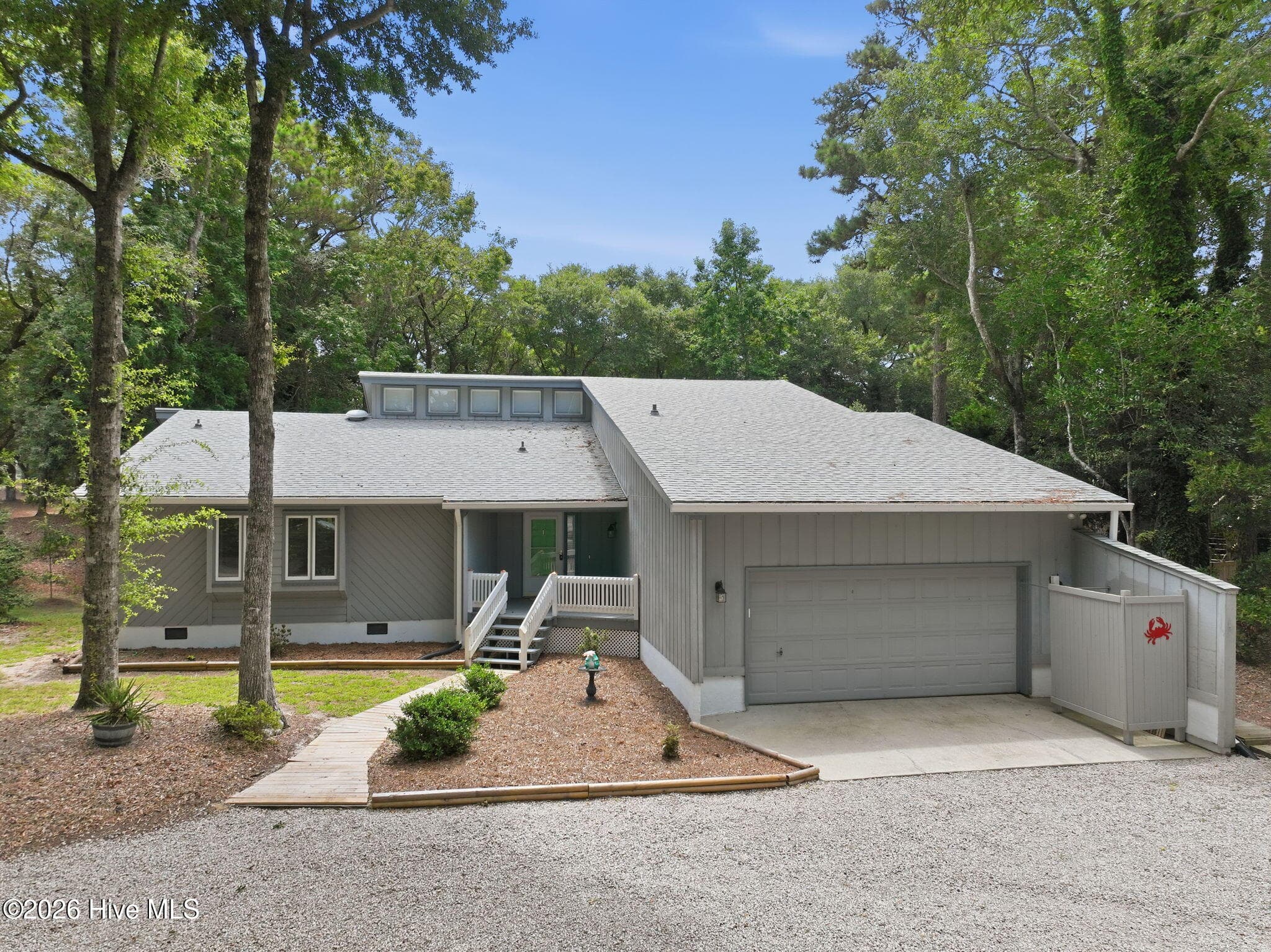 Front of 131 Oakleaf Drive, Pine Knoll Shores, NC 28512