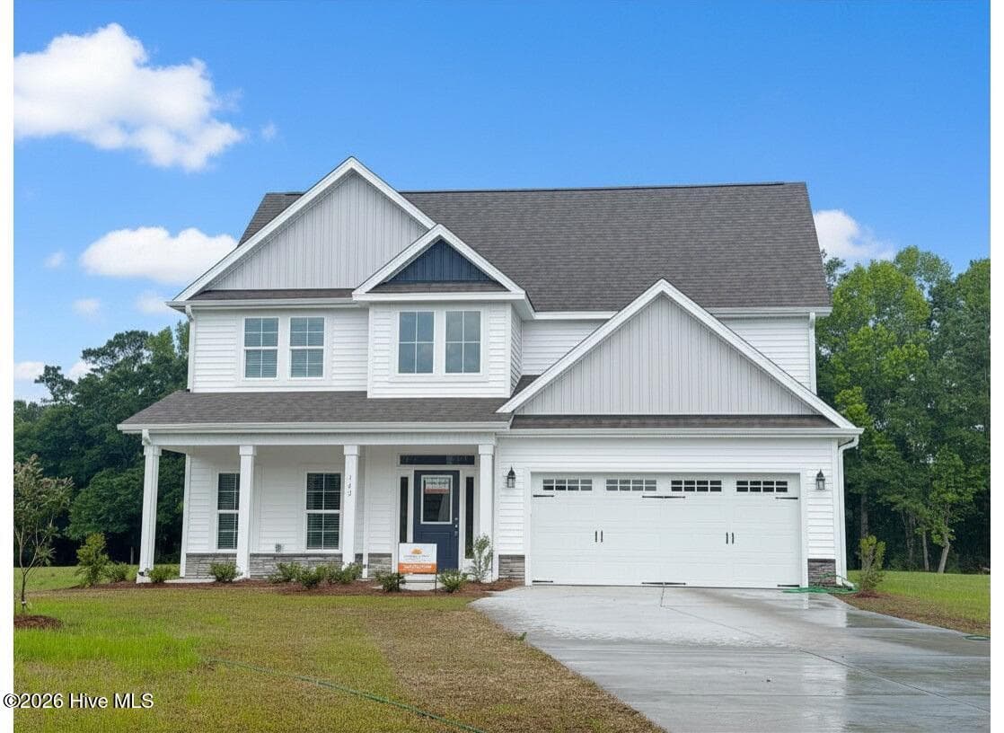 Front of 143 Cripple Creek Drive, Peletier, NC 28584
