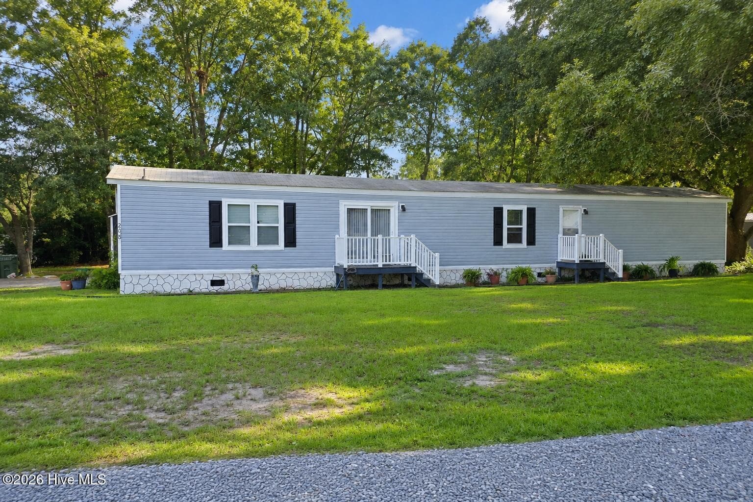 Front of 208 Branson Way, Holly Ridge, NC 28445