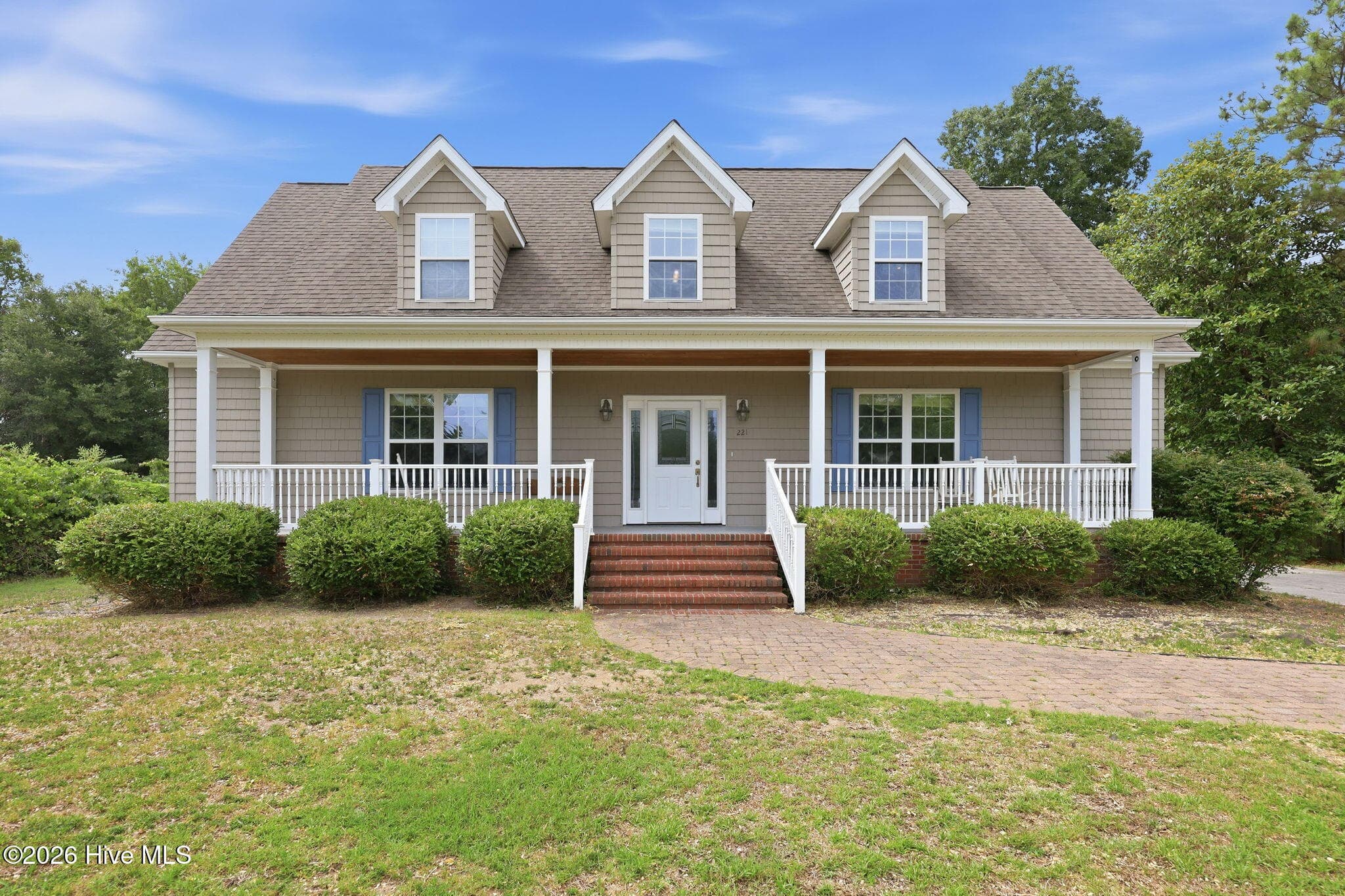 Front of 221 Oak Grove Circle, Hubert, NC 28539