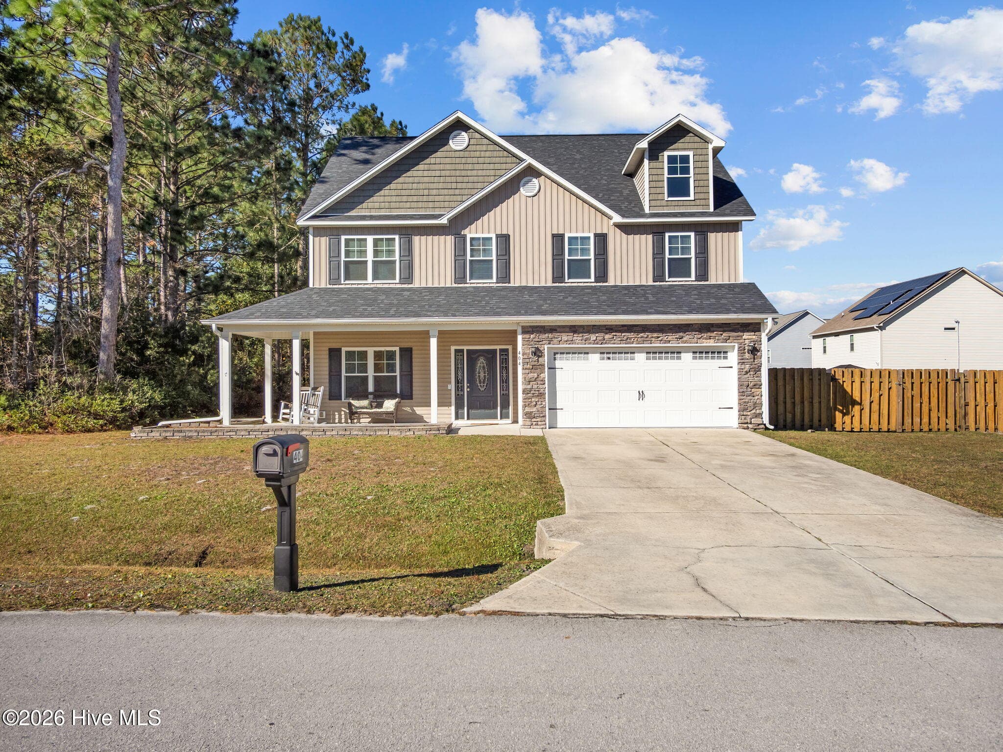 Front of 404 Kinroff Drive, Hubert, NC 28539