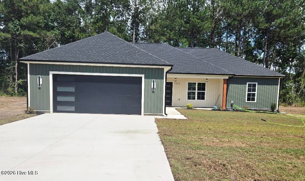 Front of 703 Windchime Court, Kinston, NC 28504