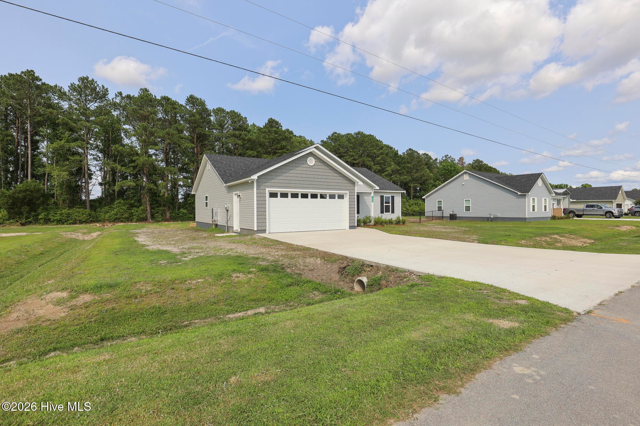 Front of 123 Buckskin Drive, Pollocksville, NC 28573