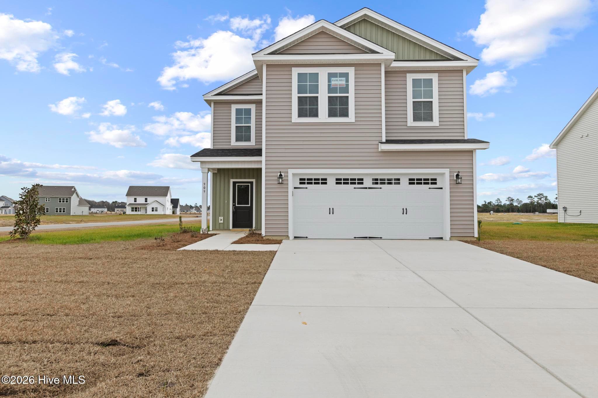 Front of 909 Wild Azalea Way, Hubert, NC 28539