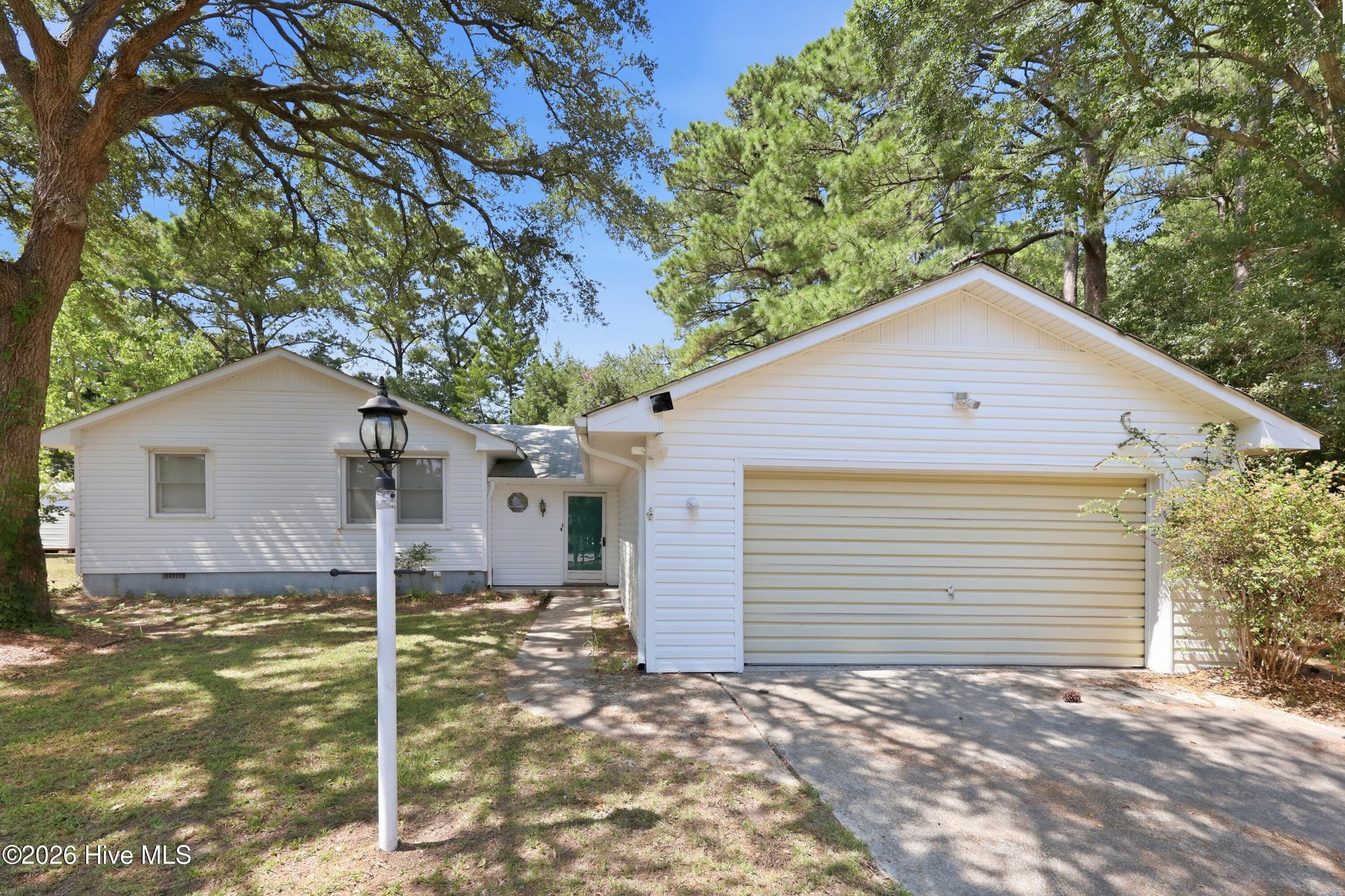 Front of 140 Lousan Drive, Cape Carteret, NC 28584