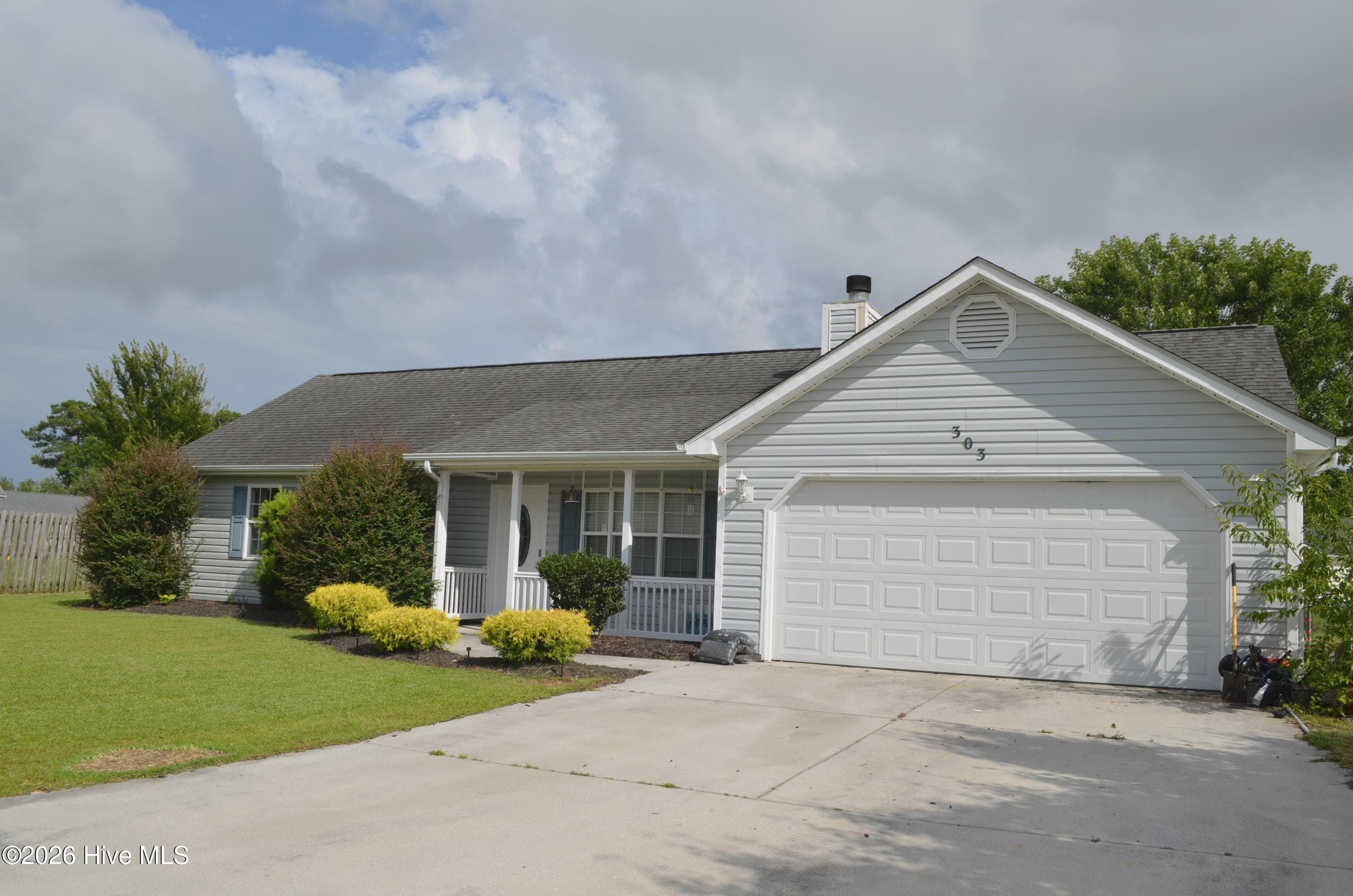 Front of 303 Marcia Court, Hubert, NC 28539