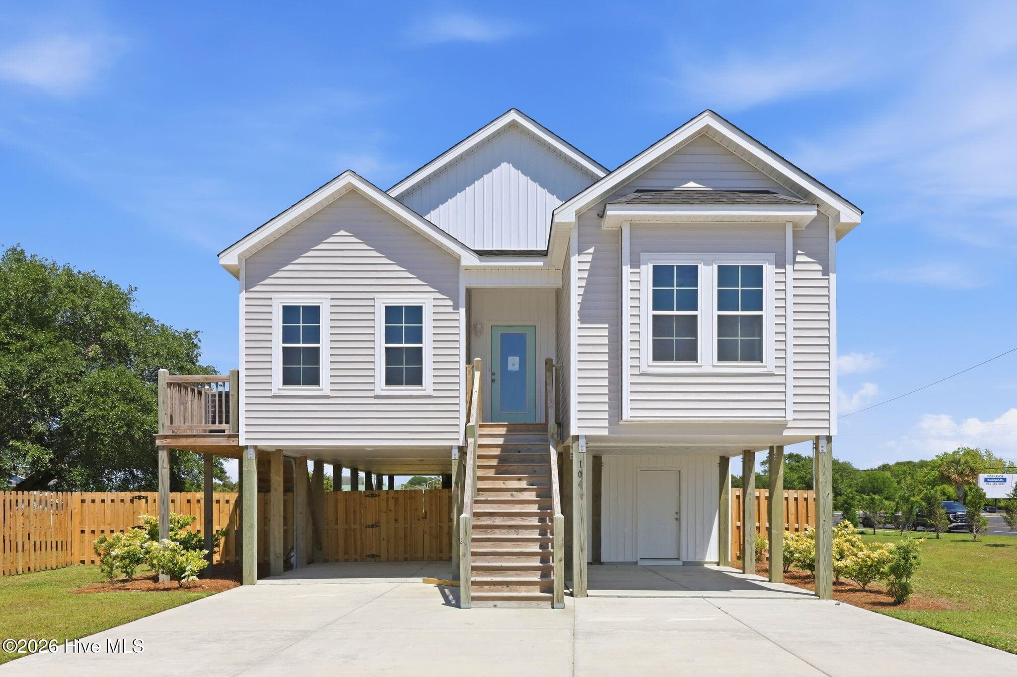 Front of 104 Flippers Cove Drive 9, Cedar Point, NC 28584