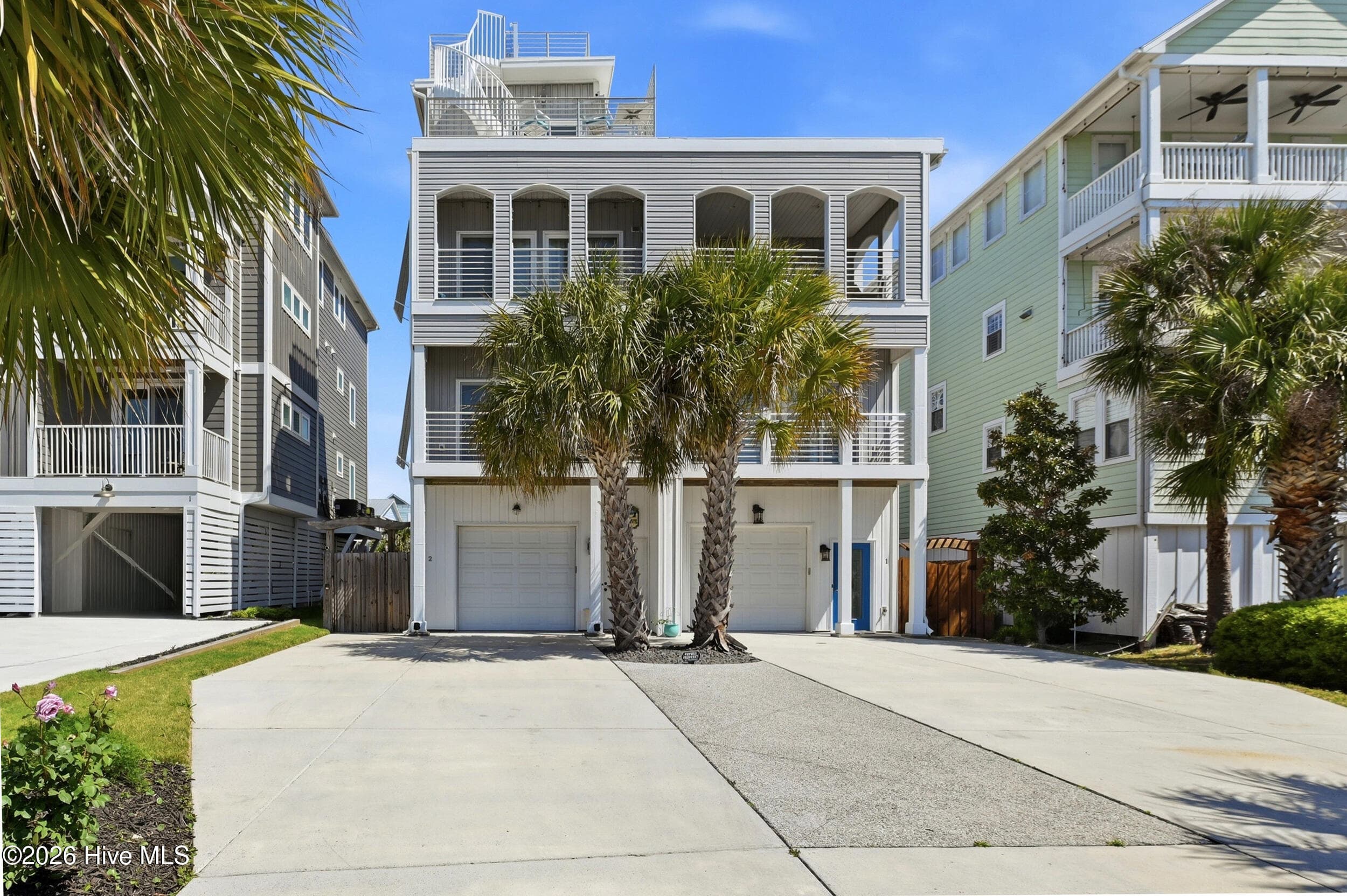 Front of 302 Alabama Avenue Unit 2, Carolina Beach, NC 28428