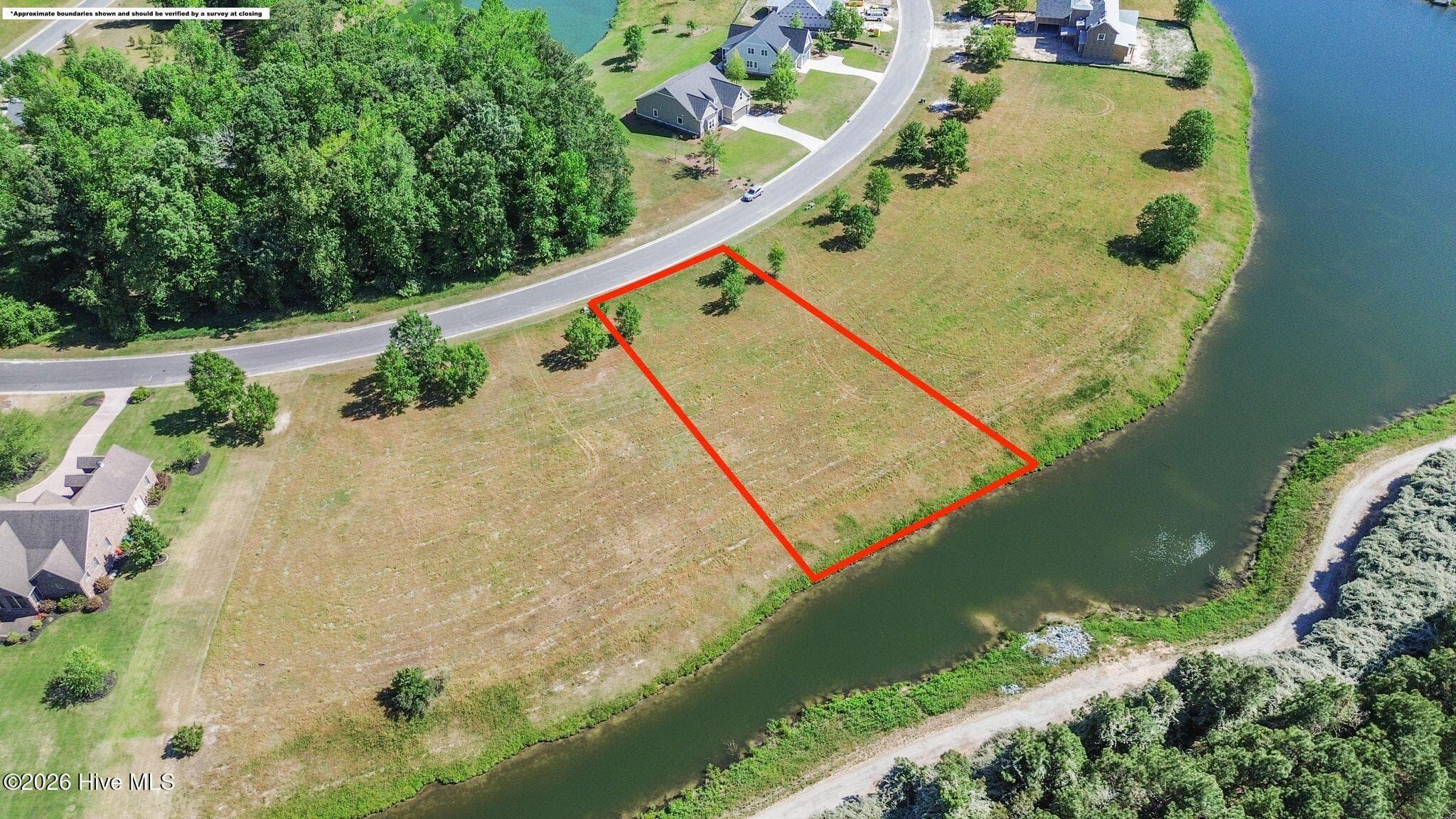 Front of 124 Sycamore Lakes Drive, Wallace, NC 28466