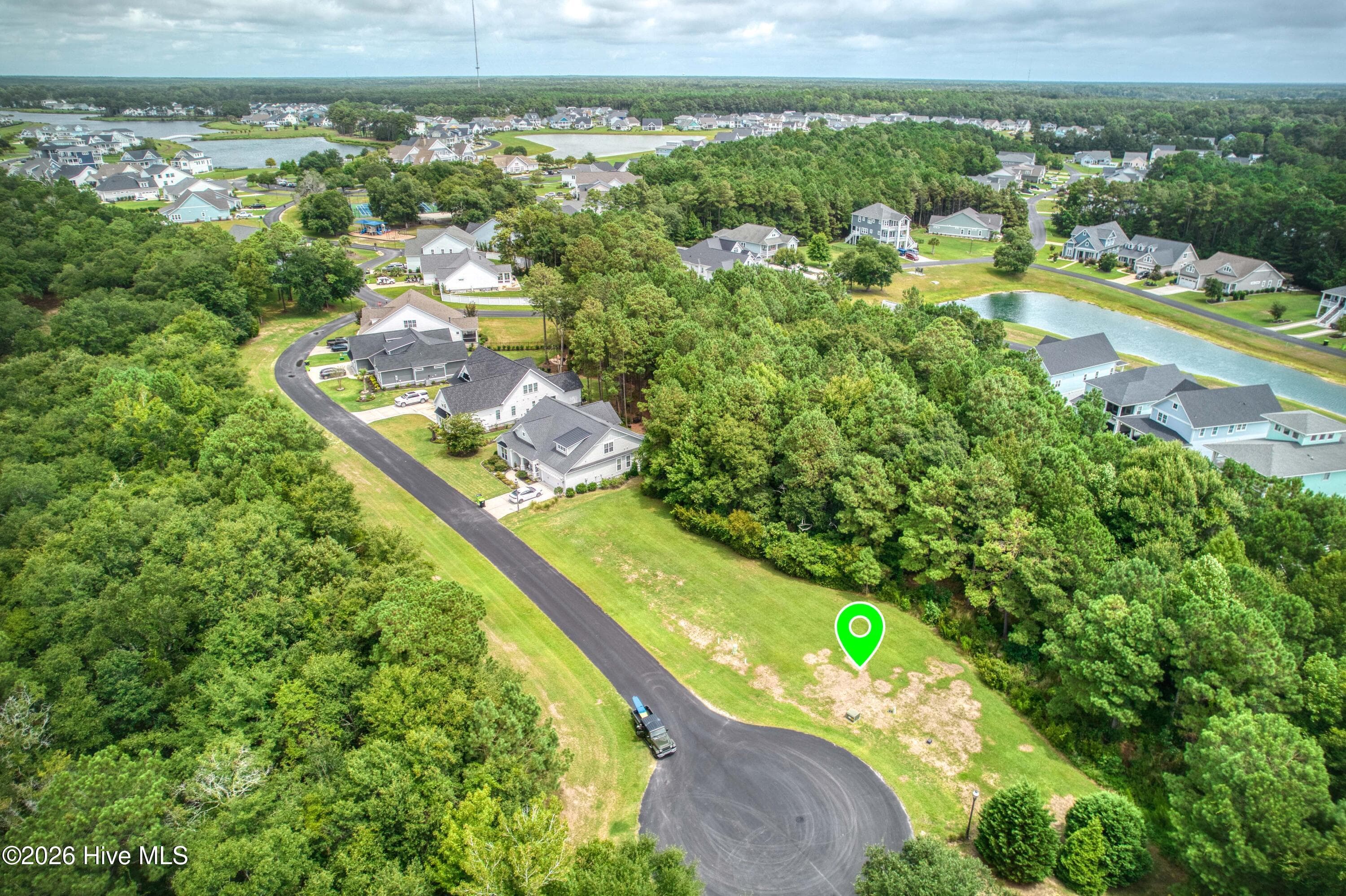 Front of 411 817M Wisteria Lane, Holly Ridge, NC 28445