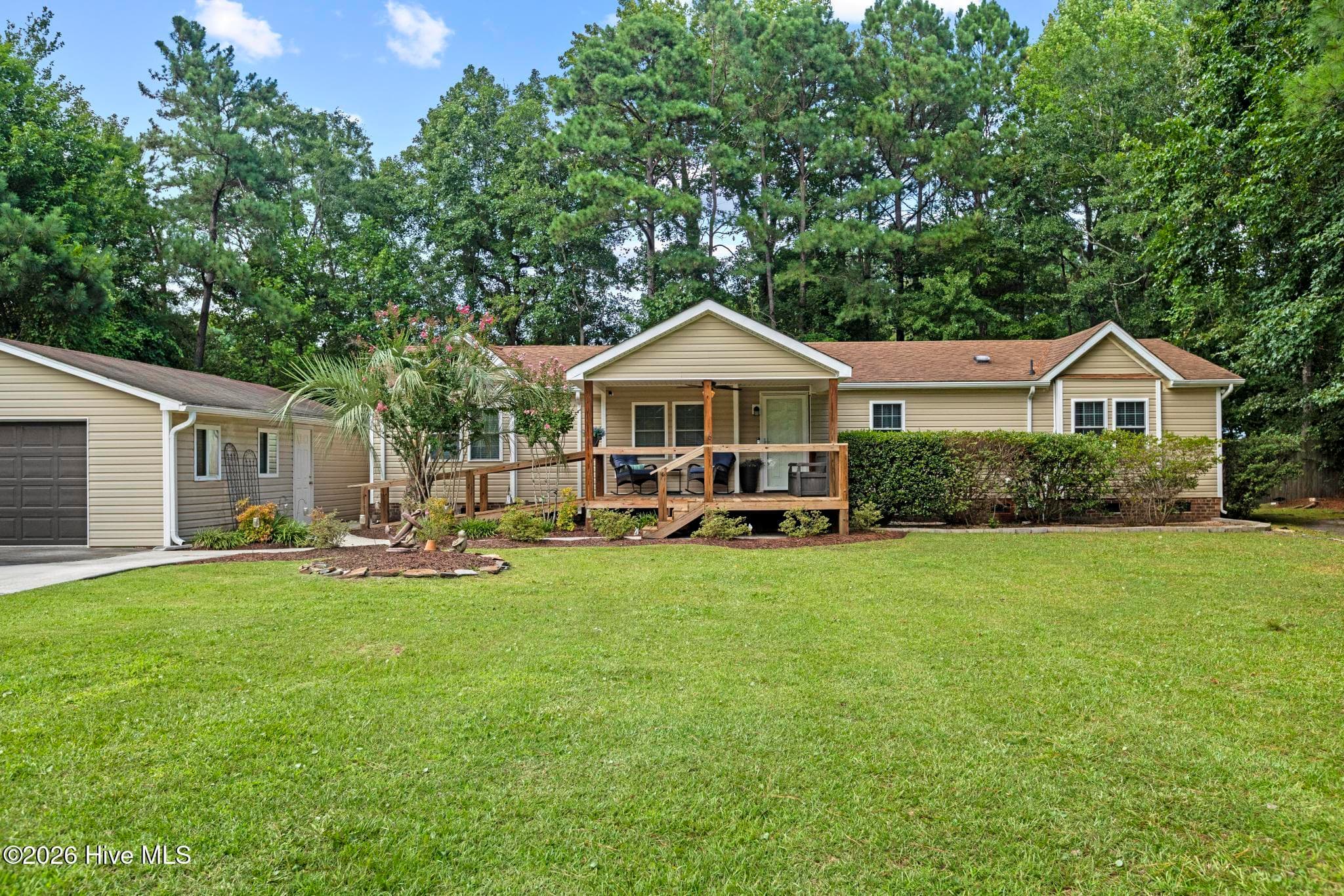 Front of 408 Quailridge Court, Peletier, NC 28584