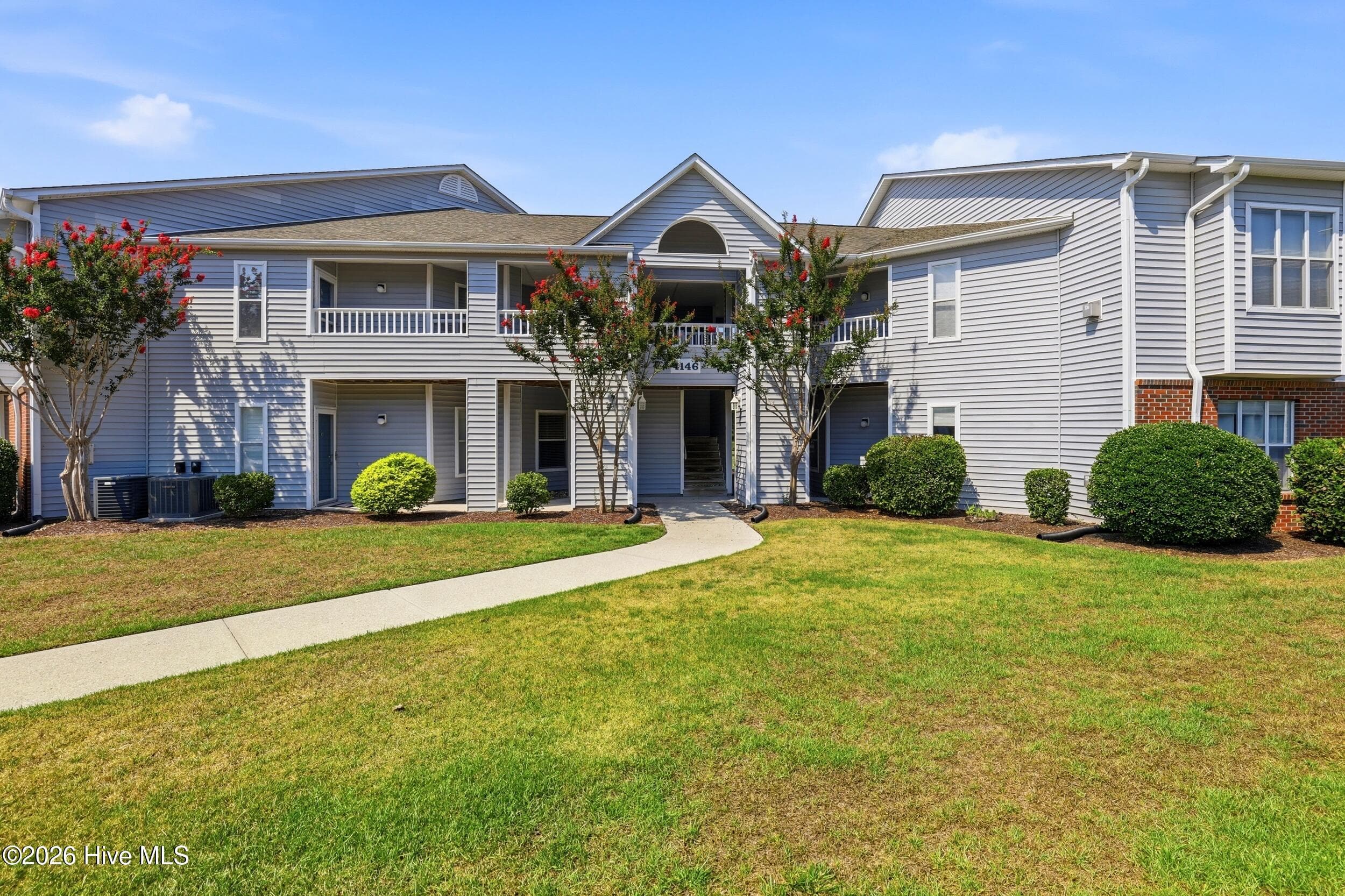 Front of 4146 Breezewood Drive Apt 203, Wilmington, NC 28412