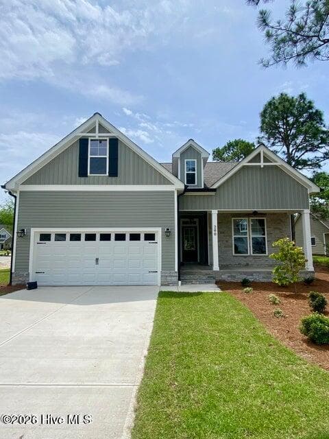 Front of 166 Deepwater Drive, Stella, NC 28582