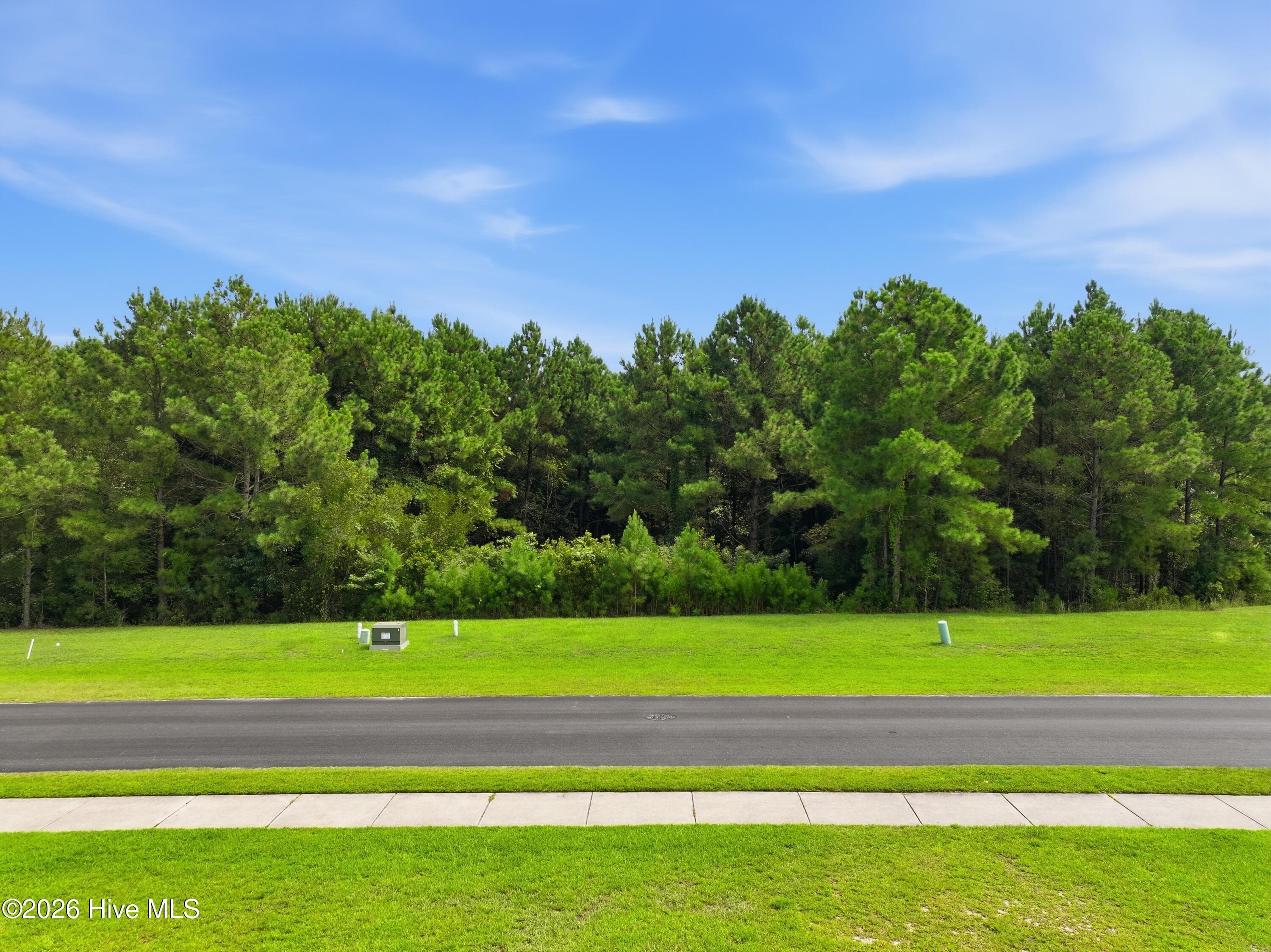 Front of 324 756 Spicer Lake Drive, Holly Ridge, NC 28445