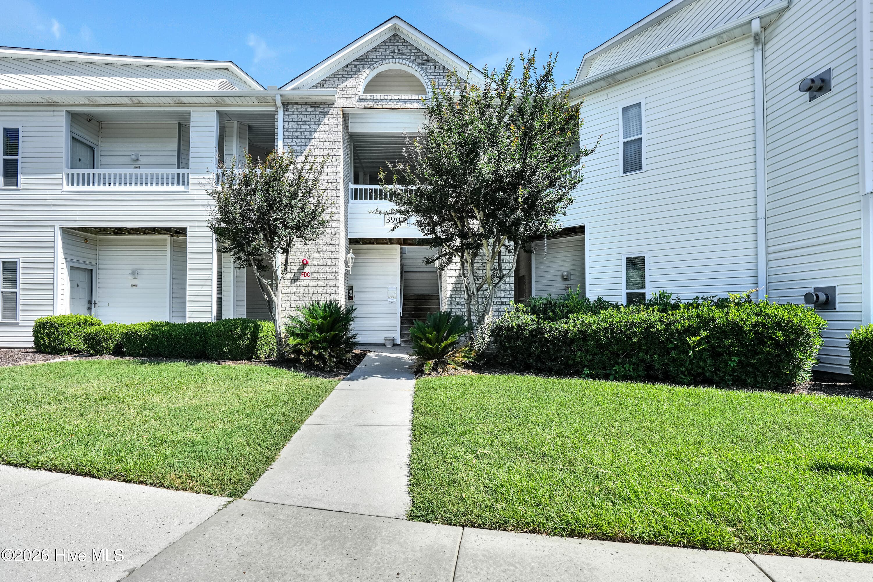 Front of 3907 River Front Place Unit 202, Wilmington, NC 28412