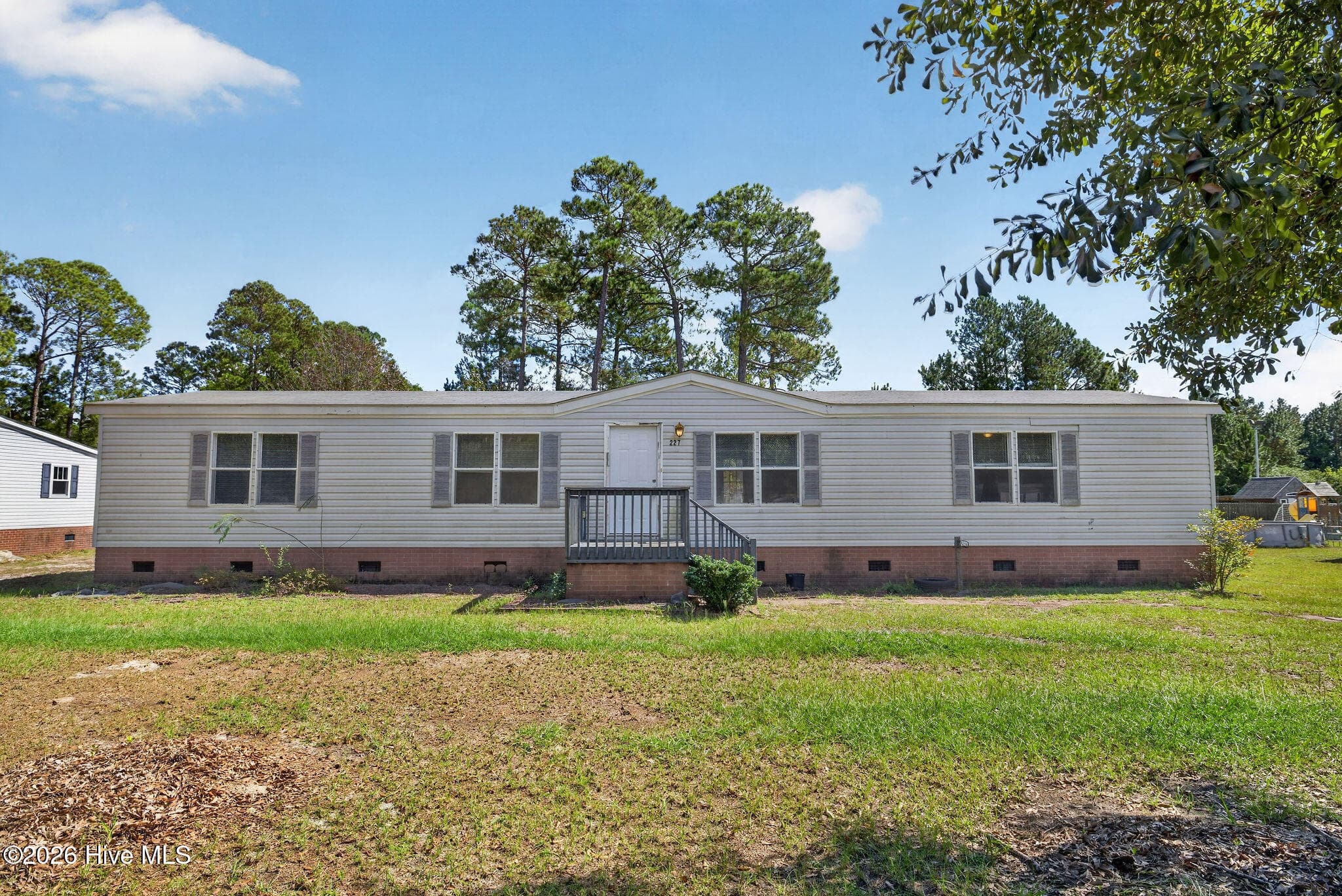 Front of 227 Hearthside Drive, Rocky Point, NC 28457