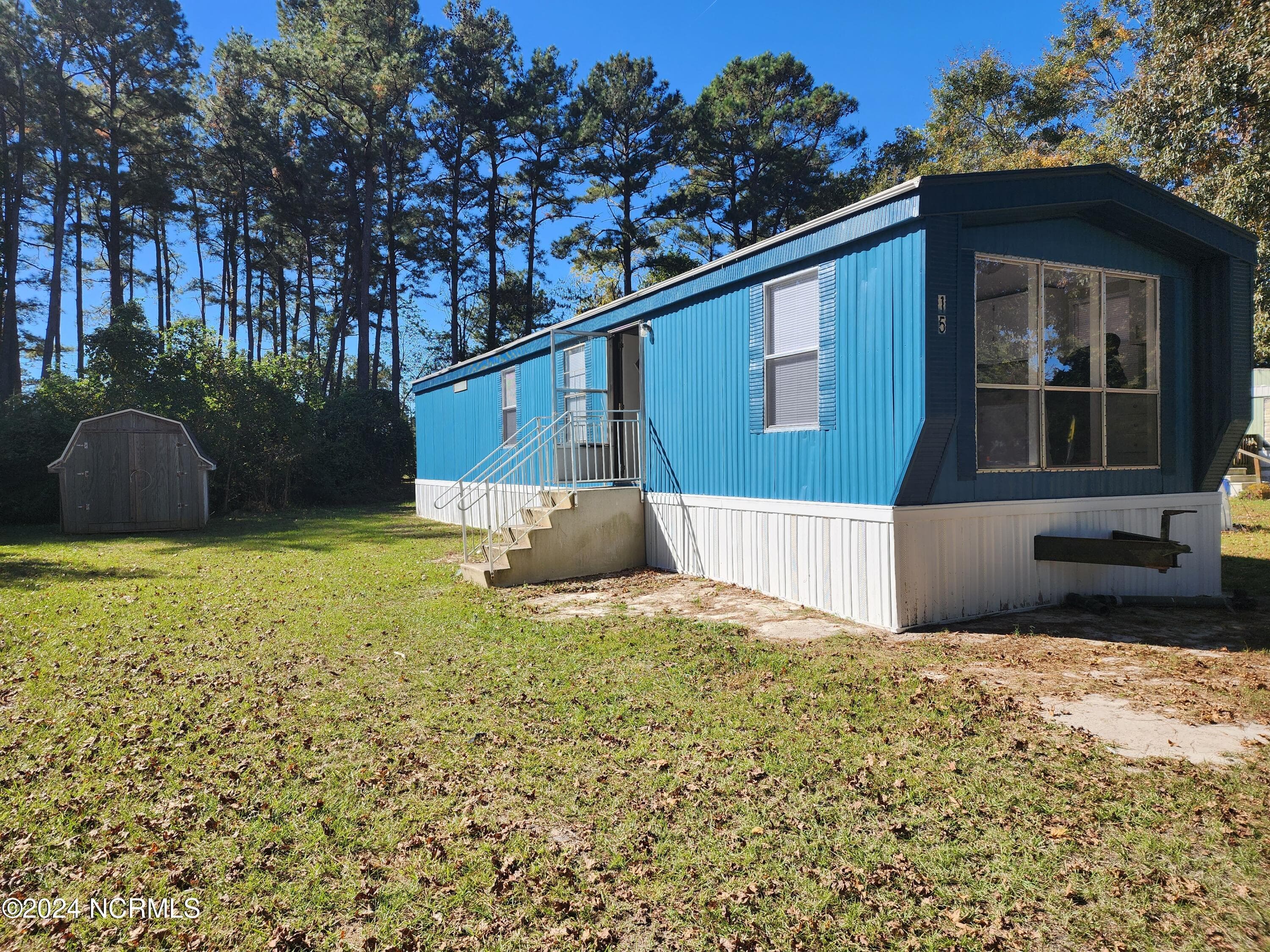 Front of 15 Marlette Street, Hubert, NC 28539