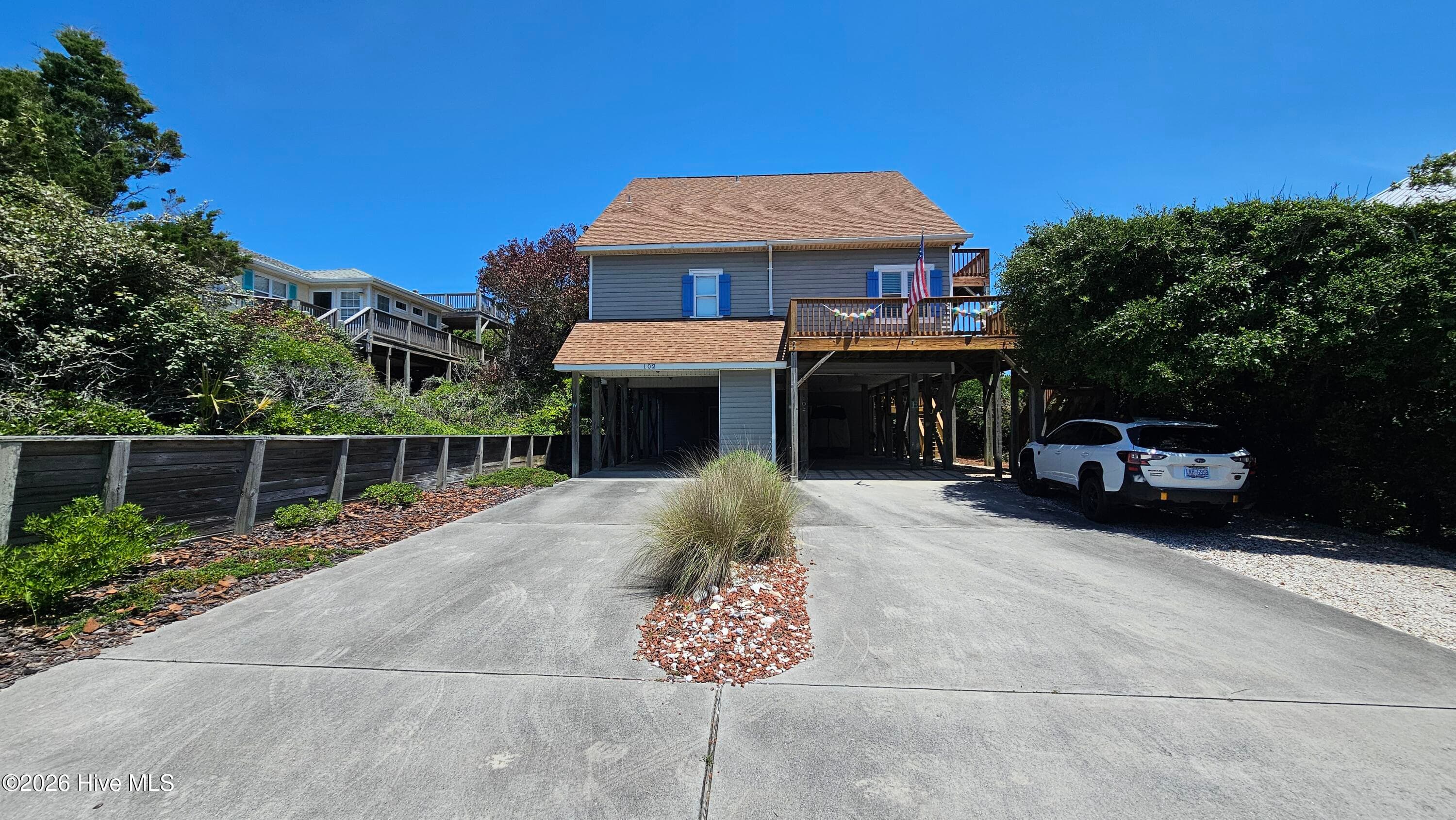 Front of 102 W Scotch Bonnet Drive, Emerald Isle, NC 28594
