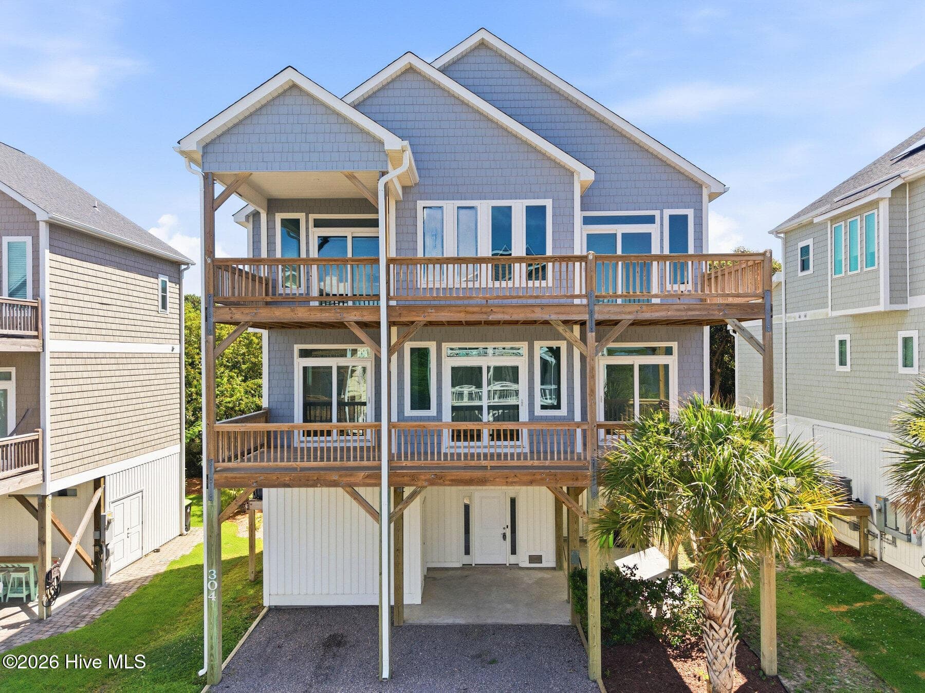 Front of 304 Oceanaire Lane, Surf City, NC 28445