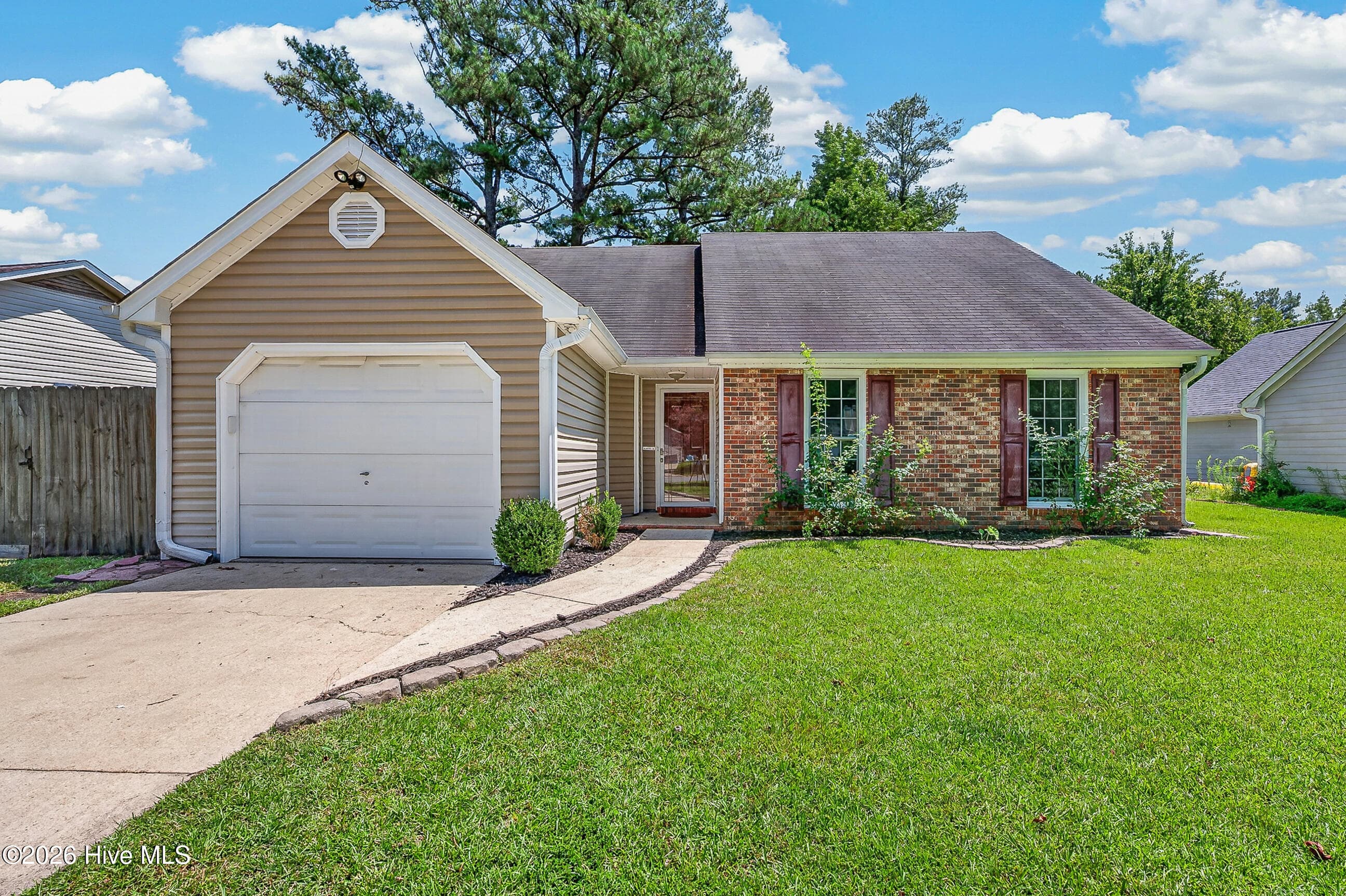 Front of 116 Hunting Green Drive, Jacksonville, NC 28546