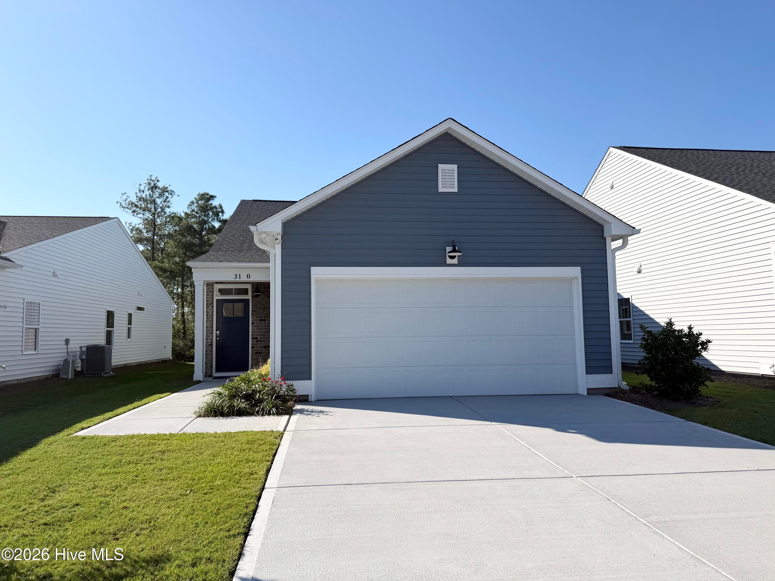 Front of 3137 Weather Side Drive SE 155, Southport, NC 28461