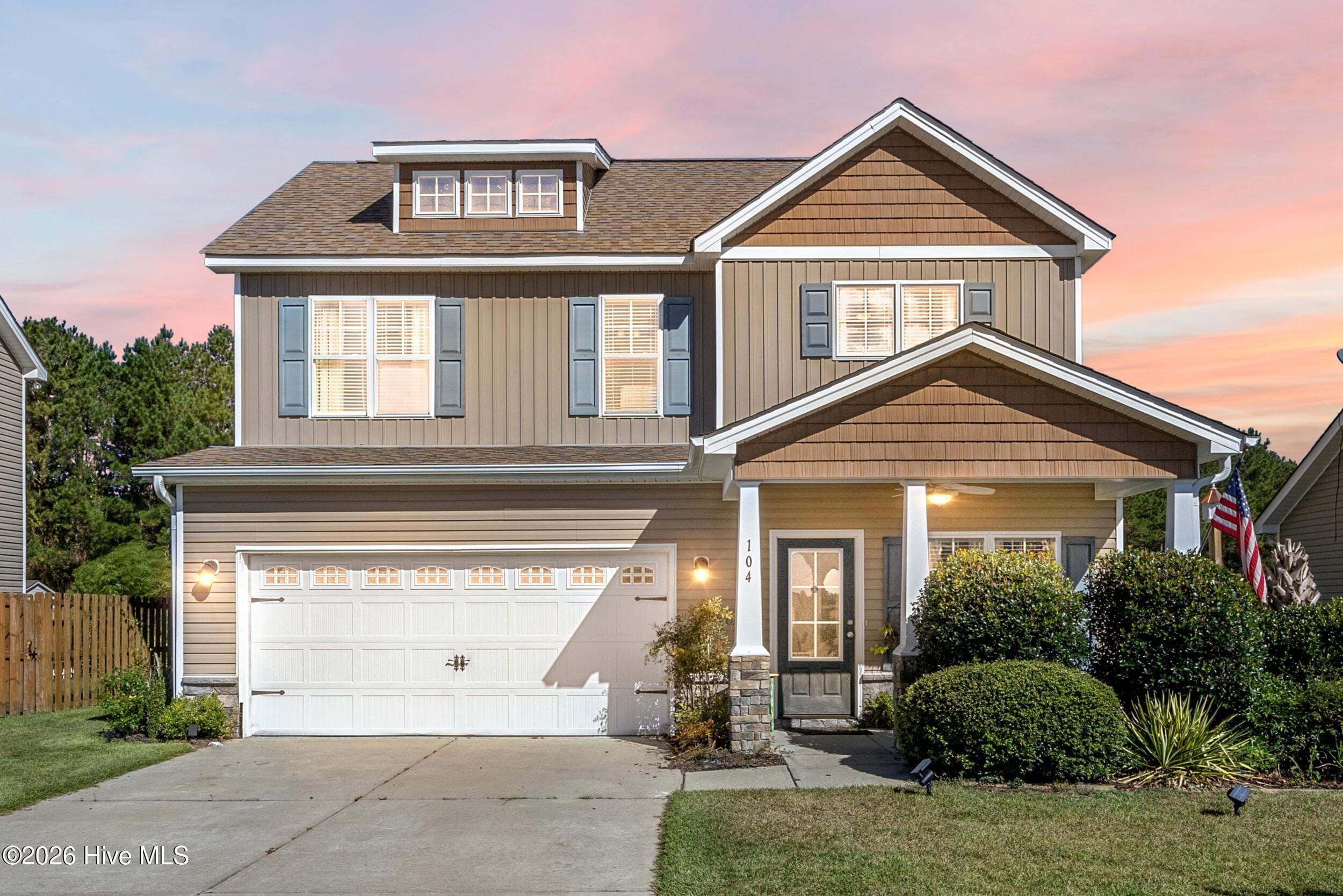 Front of 104 Saw Grass Drive, Maple Hill, NC 28454