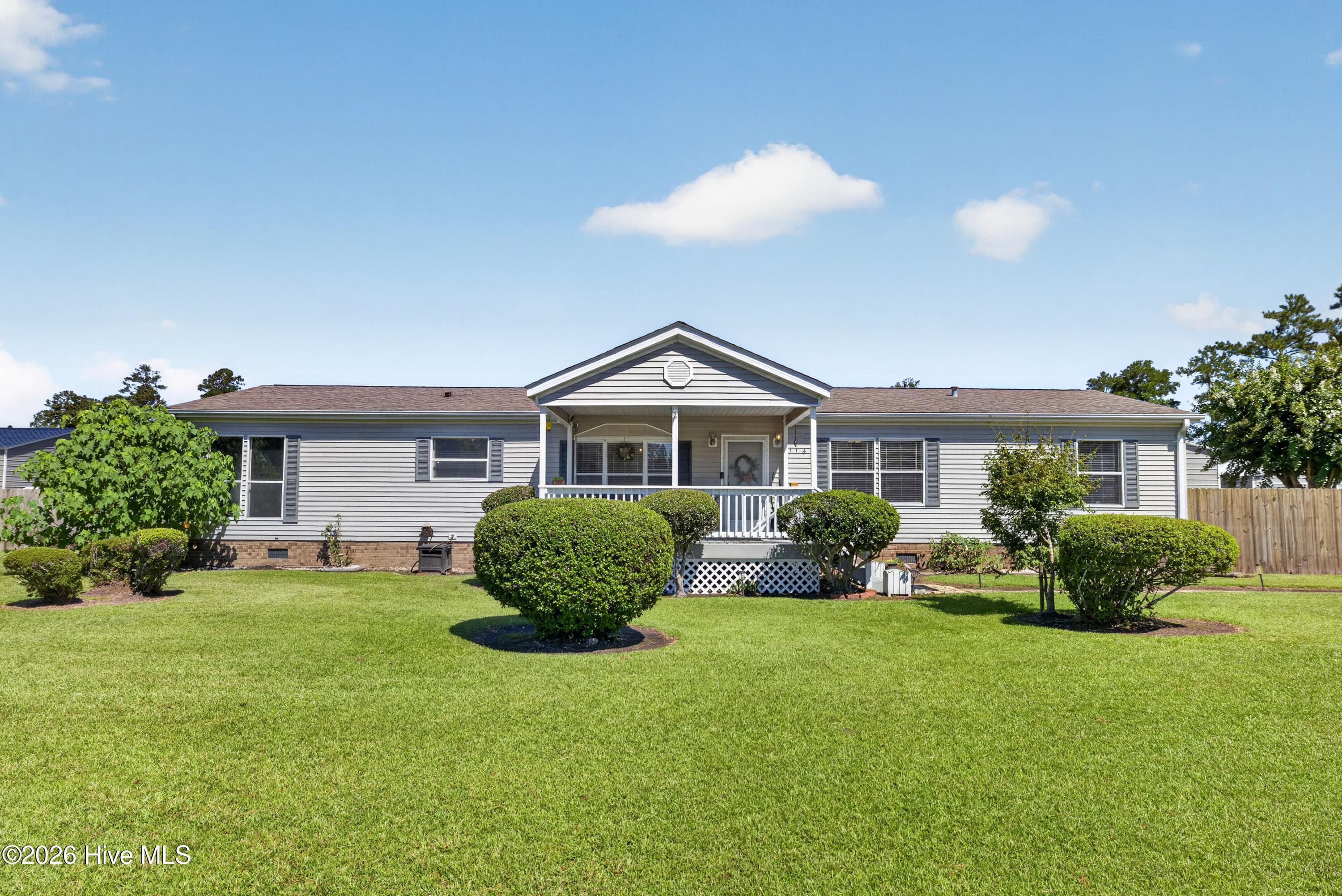 Front of 114 Bellhammon Drive, Rocky Point, NC 28457
