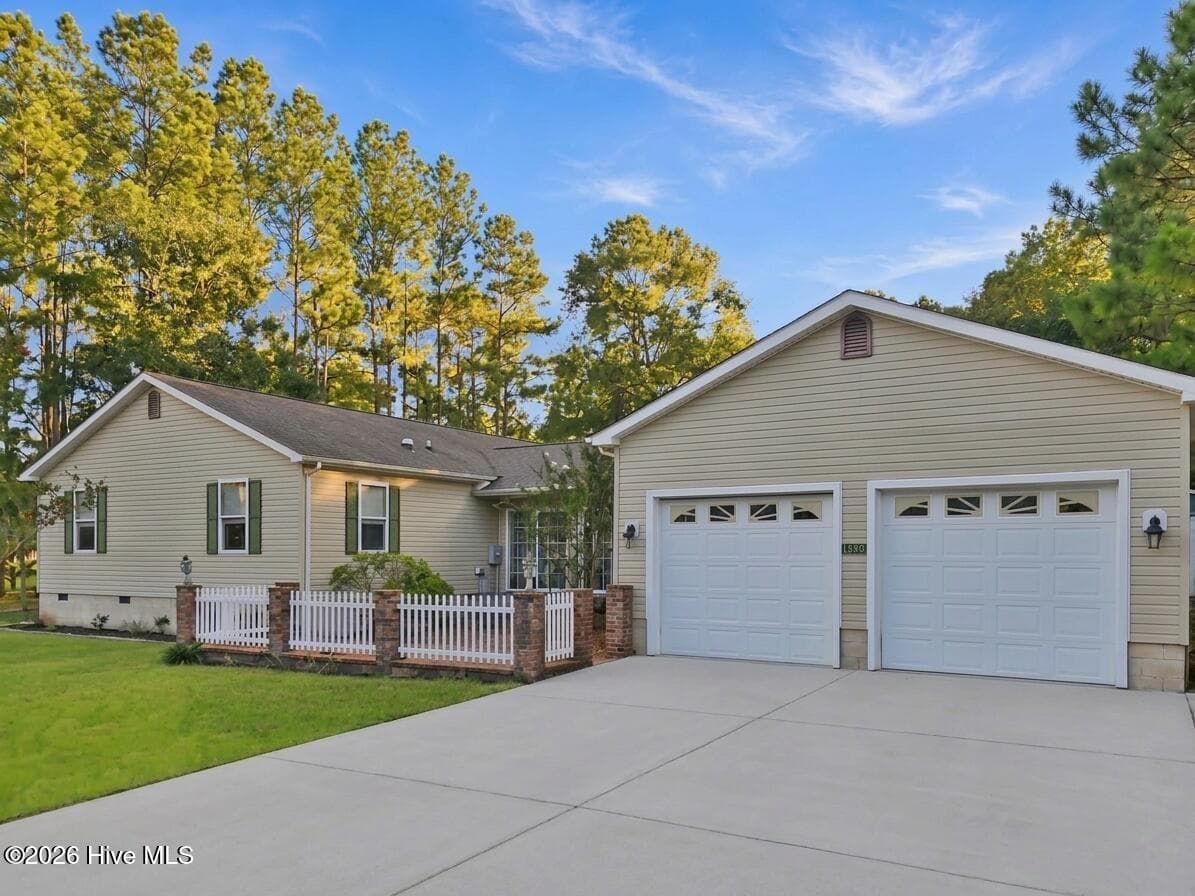 Front of 1299 N Shore Drive, Boiling Spring Lakes, NC 28461