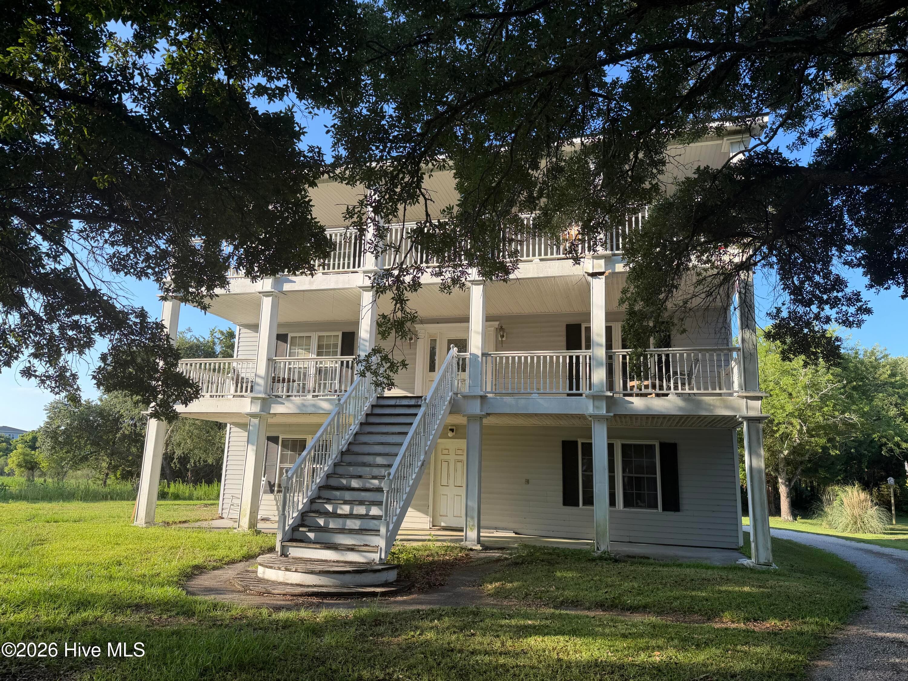 Front of 215 Shell Drive, Sneads Ferry, NC 28460