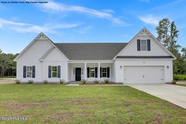 Front of 800 N Sandy Shore Court, Holly Ridge, NC 28445