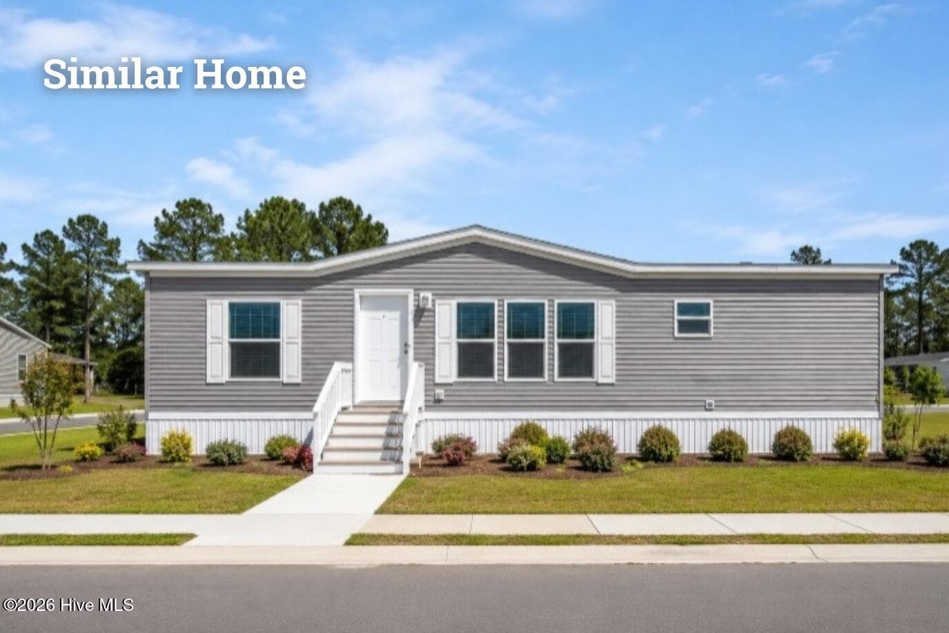 Front of 152 Quail Point Drive, Hubert, NC 28539