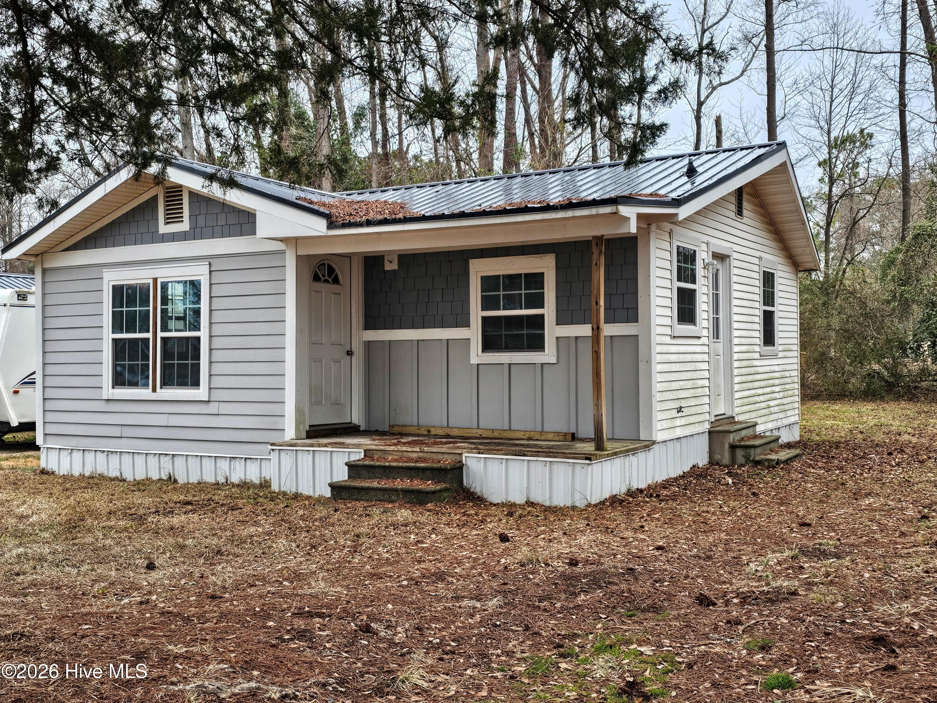 Front of 410 Devane Street, Wallace, NC 28466