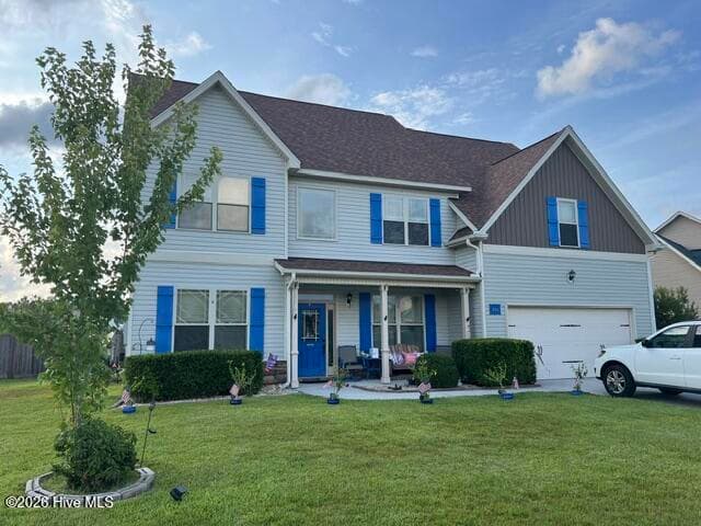 Front of 304 SW Plantation Drive, Maple Hill, NC 28454