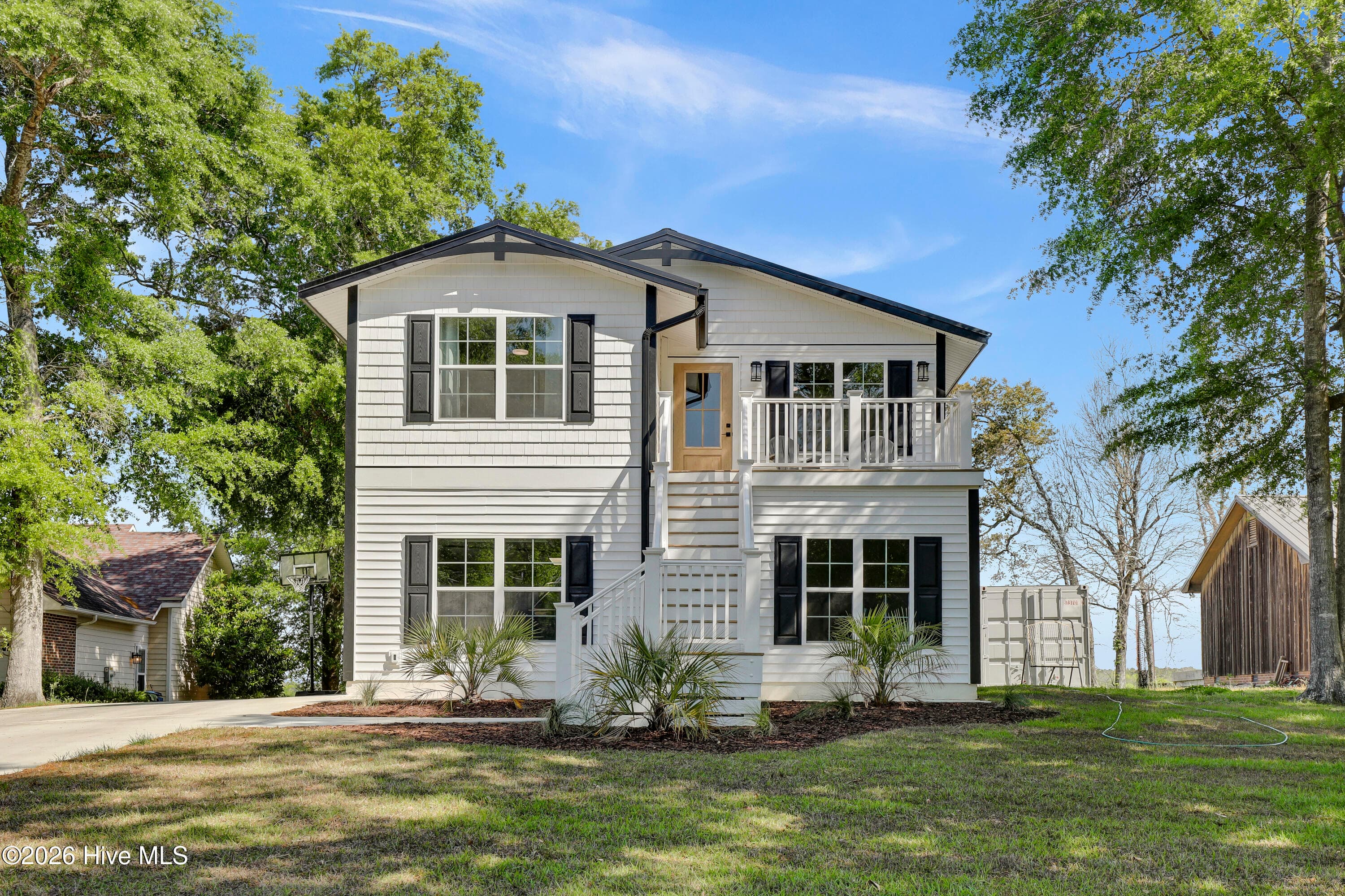 Front of 725 Chadwick Shores Drive, Sneads Ferry, NC 28460