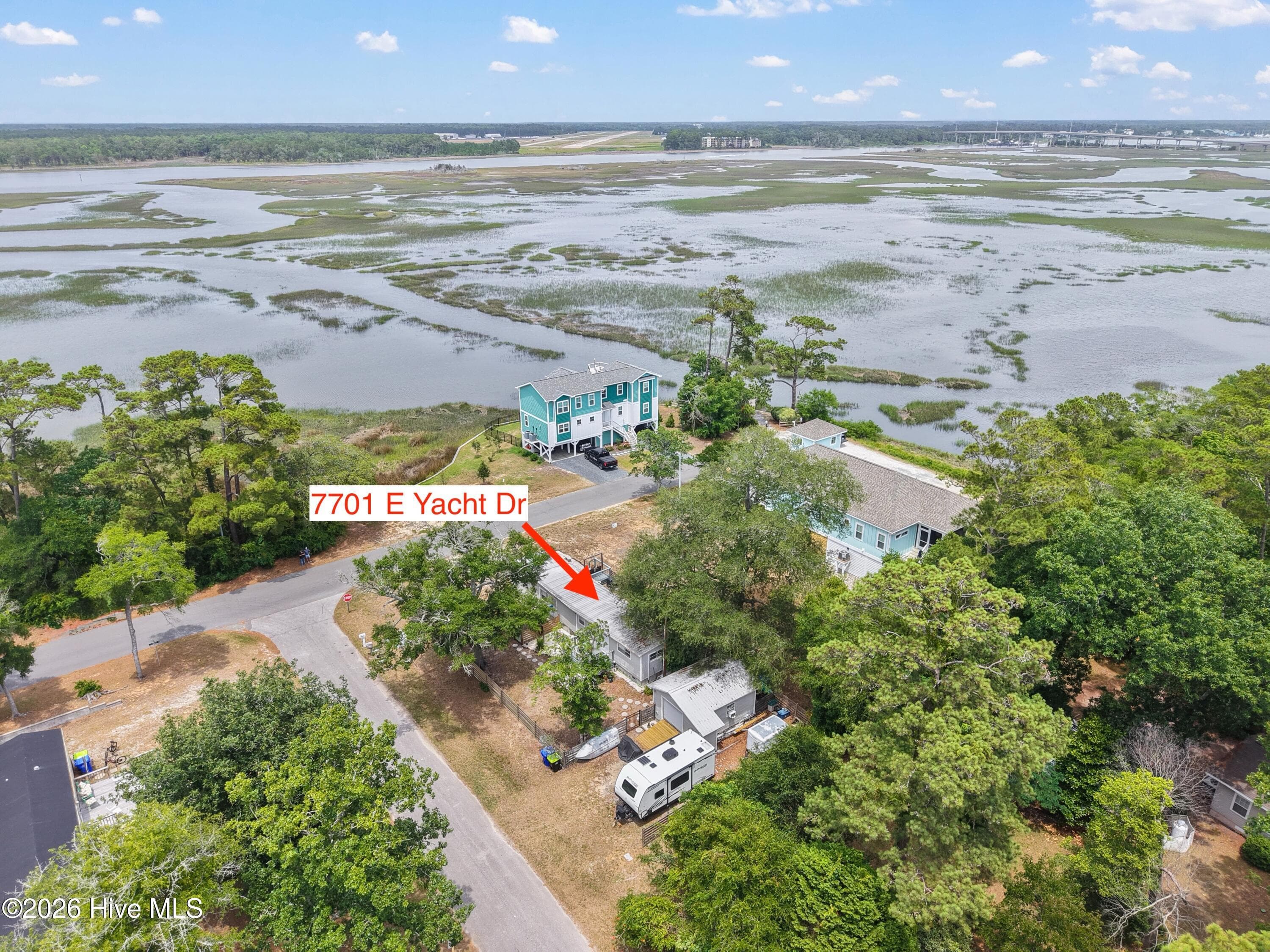 Front of 7701 E Yacht Drive, Oak Island, NC 28465