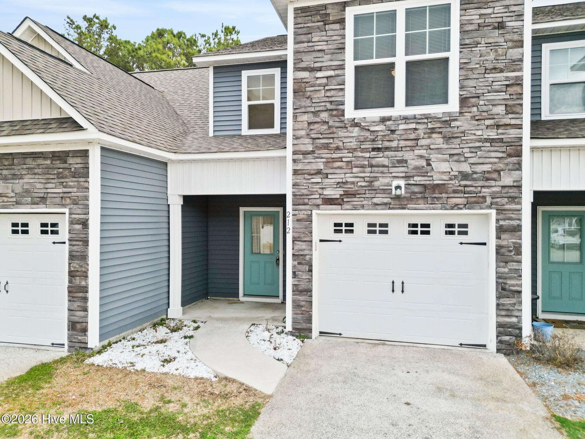 Front of 212 N Stingray Lane, Sneads Ferry, NC 28460