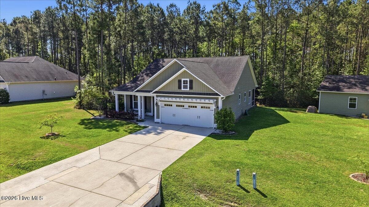Front of 111 W Huckleberry Way, Rocky Point, NC 28457